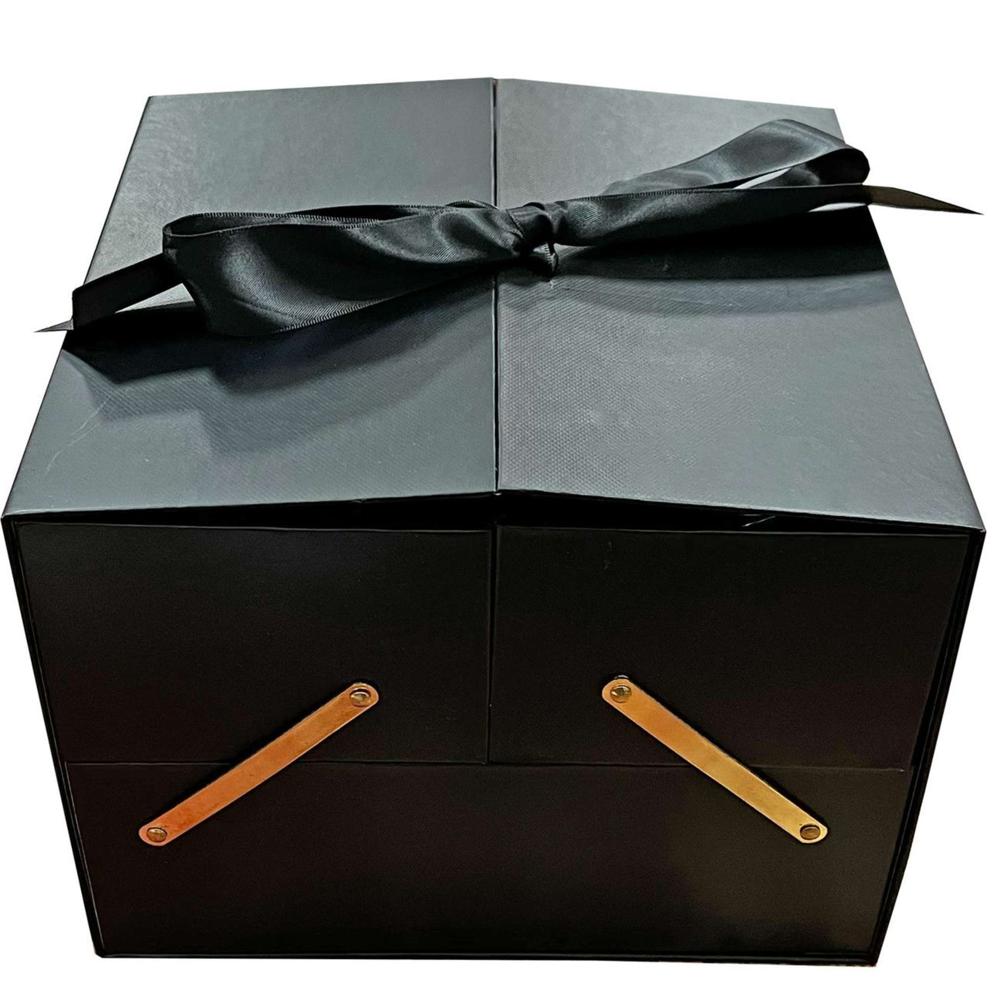 Black gift box with a satin ribbon bow and gold handles