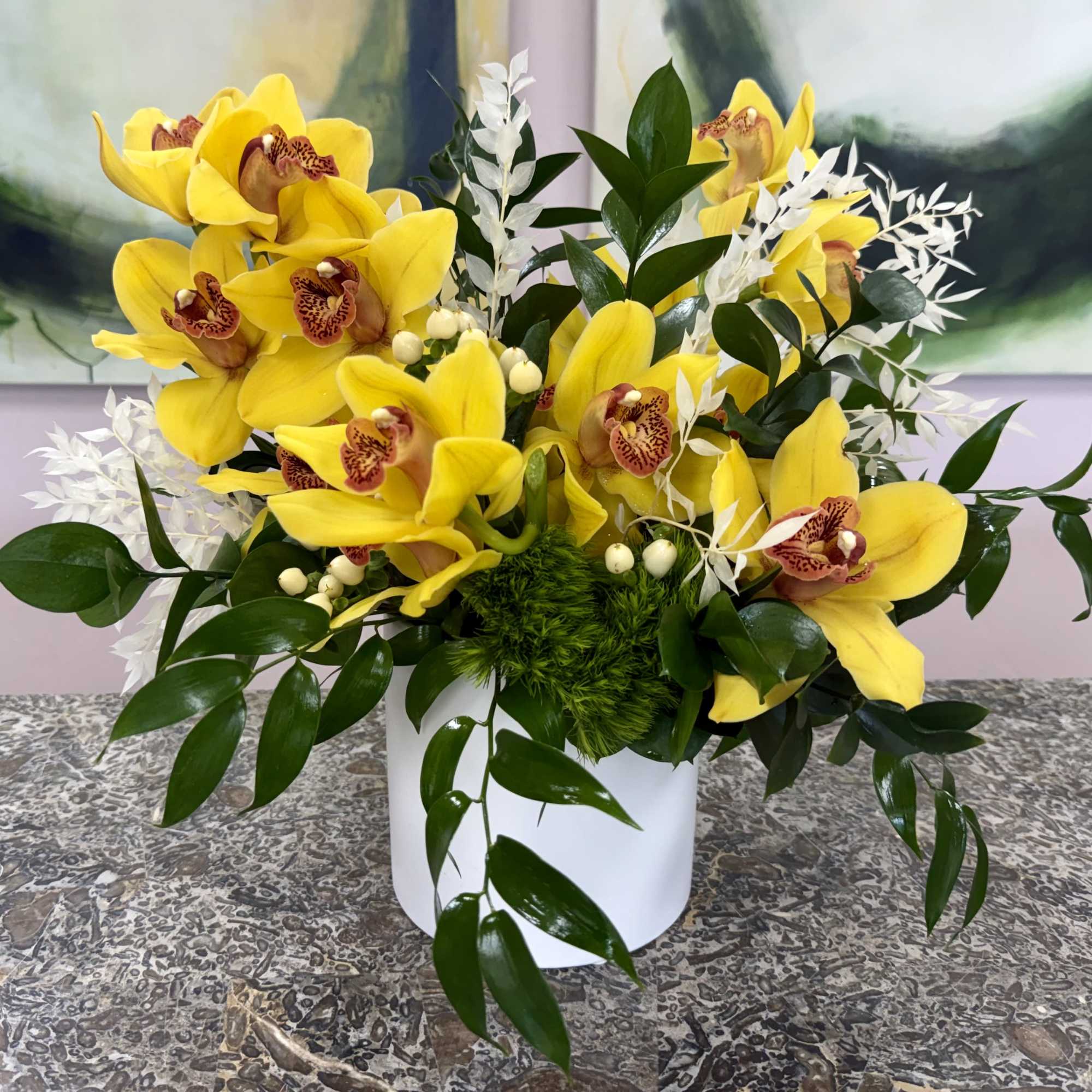 Clusters of bright yellow orchids with speckled centers make a cheerful statement
