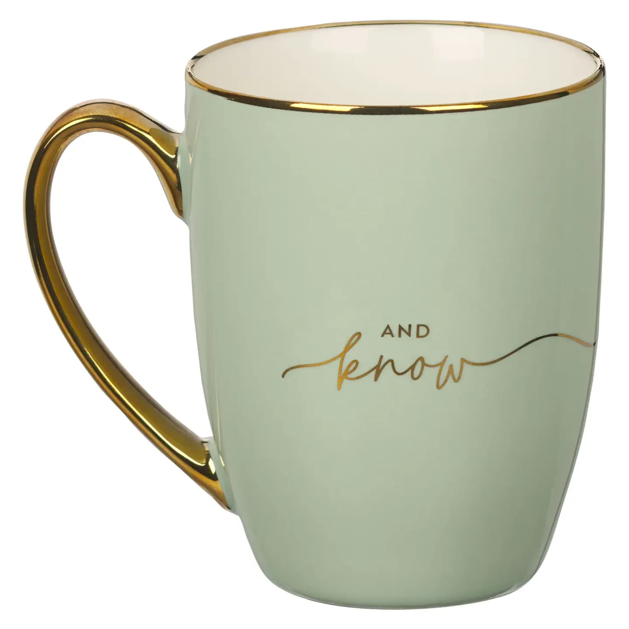 The Be Still Soft Green and Gold Ceramic Coffee Mug is a