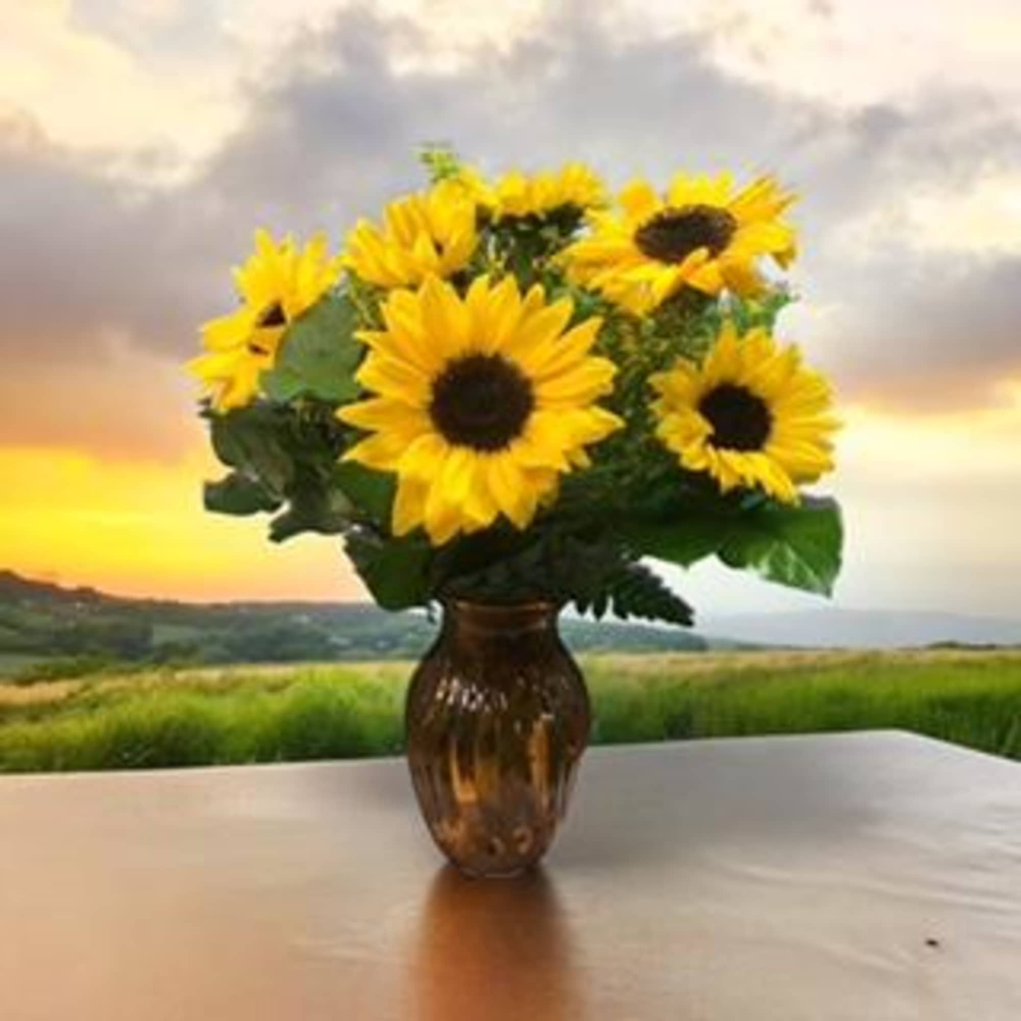 Sunflower bouquet in an amber glass vase