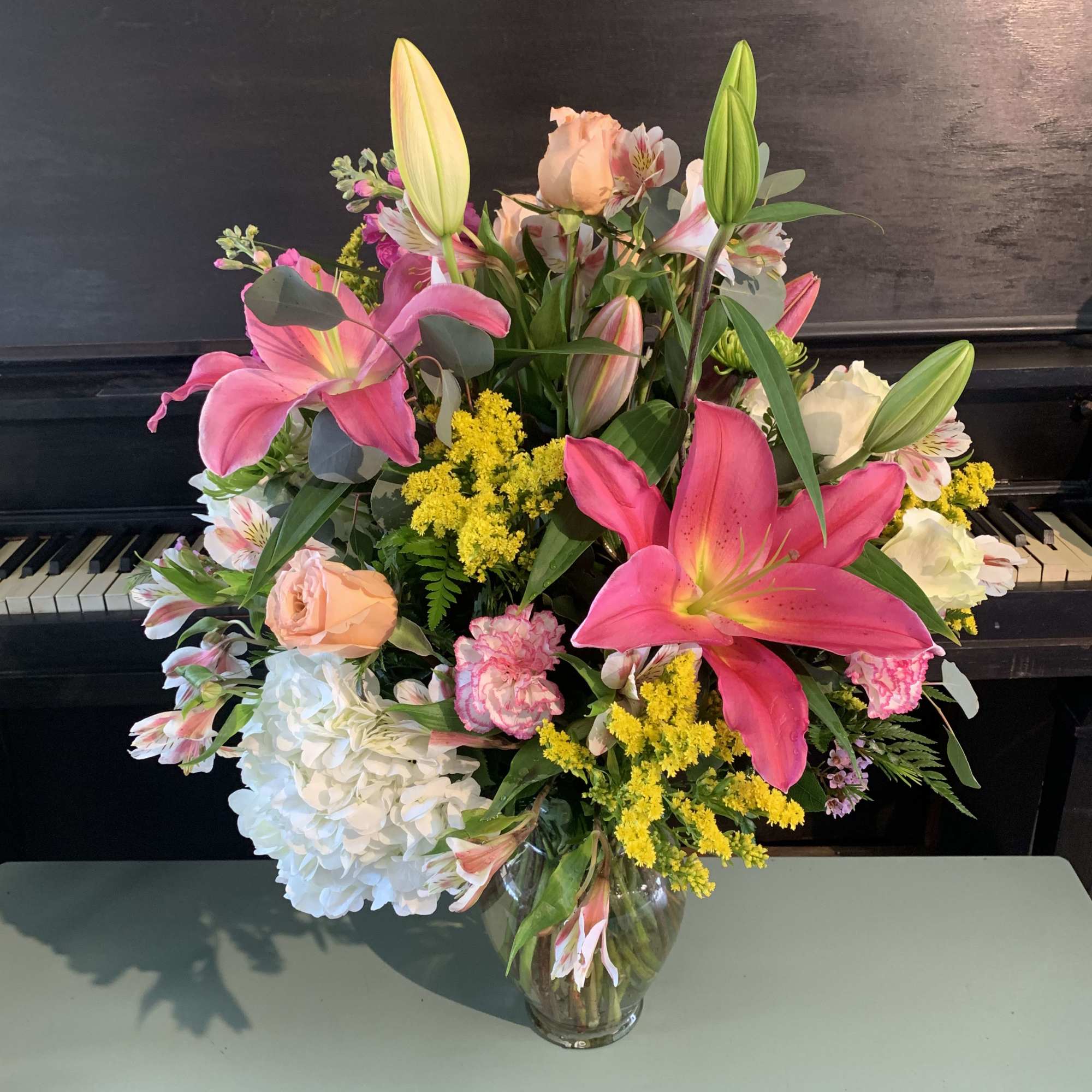 A bright and colorful arrangement mixed with the freshest of flowers. These, photo 2 of 2