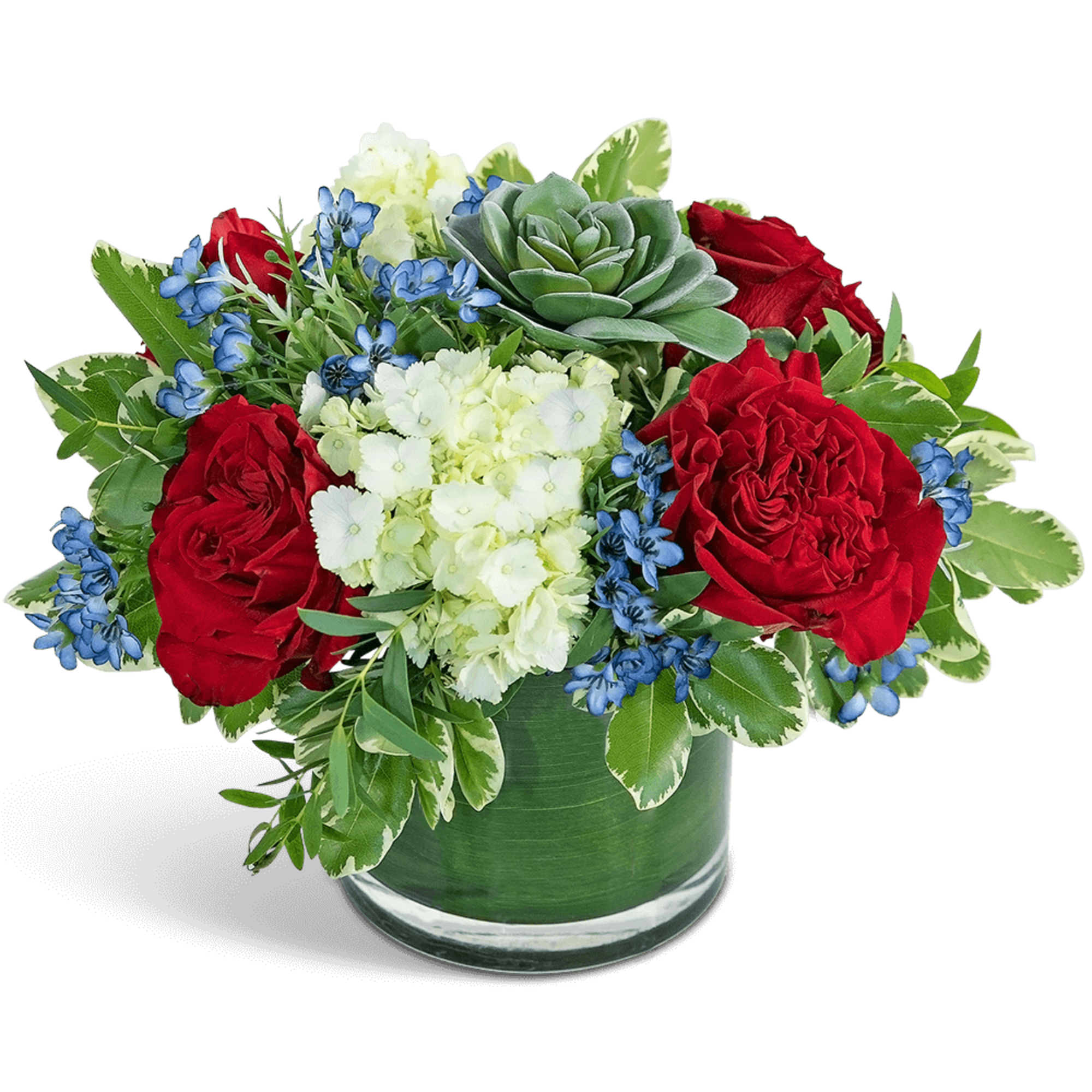 Red roses and white flowers in a glass vase with a succulent
