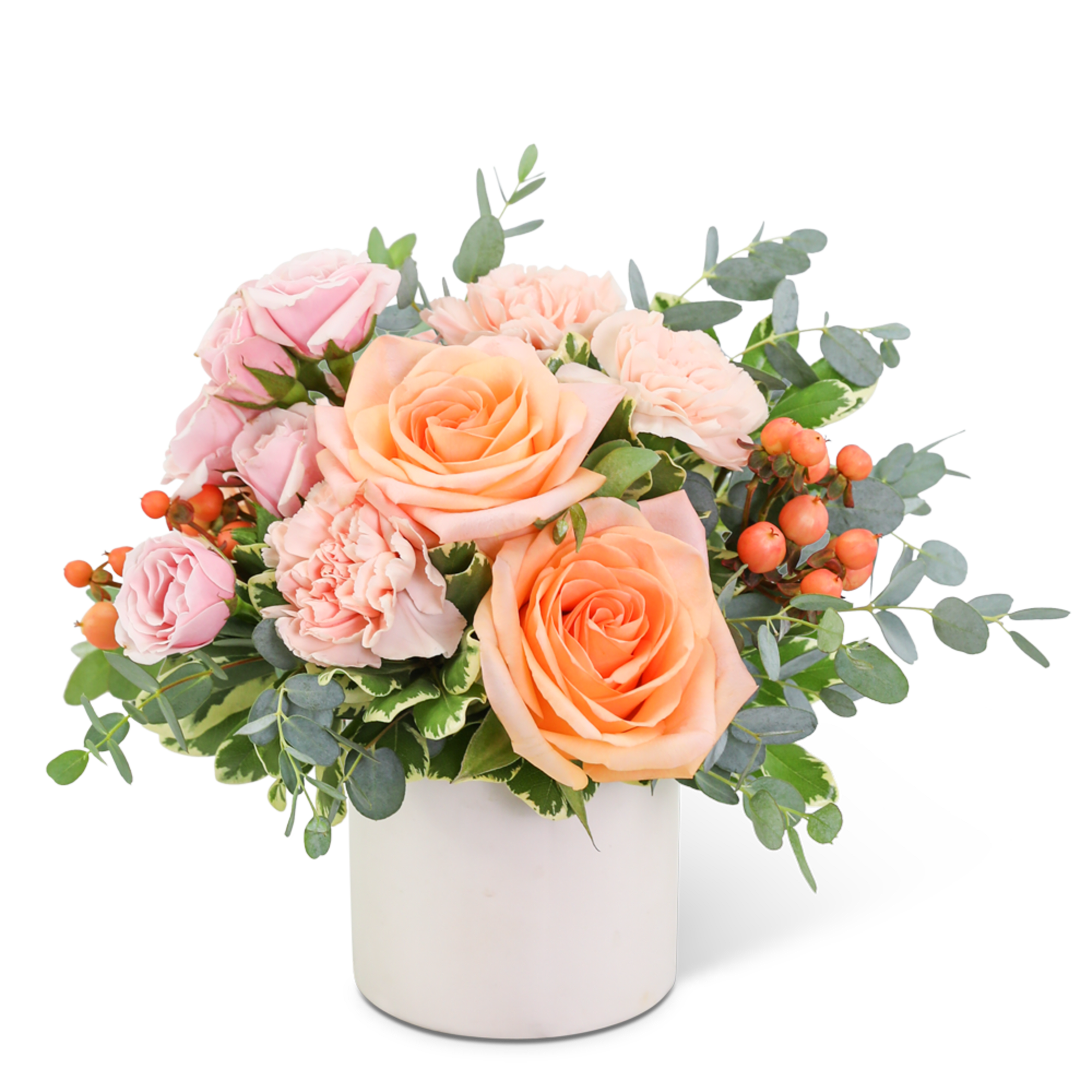 Pink and peach roses in a white vase