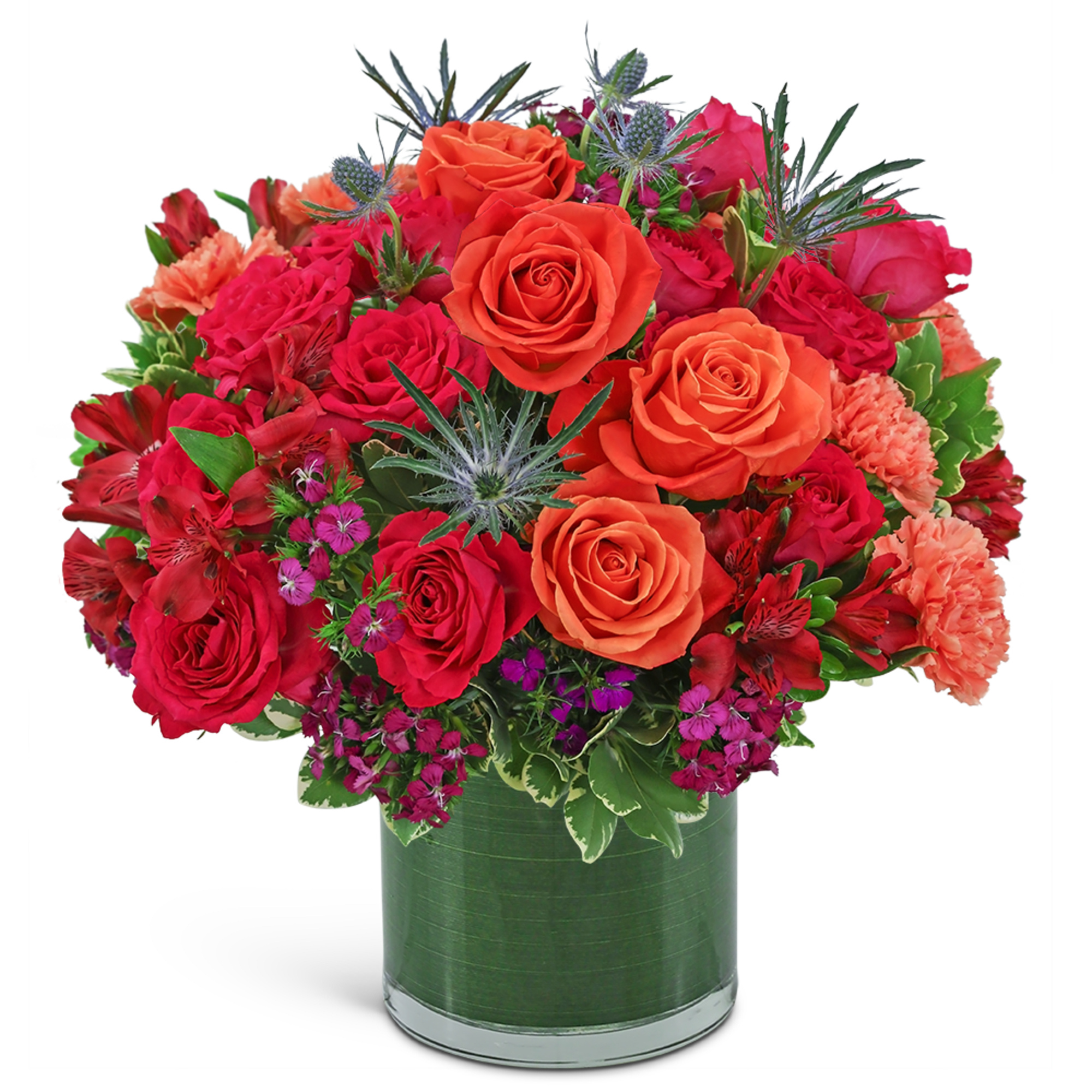 Red and orange rose bouquet in a green glass vase