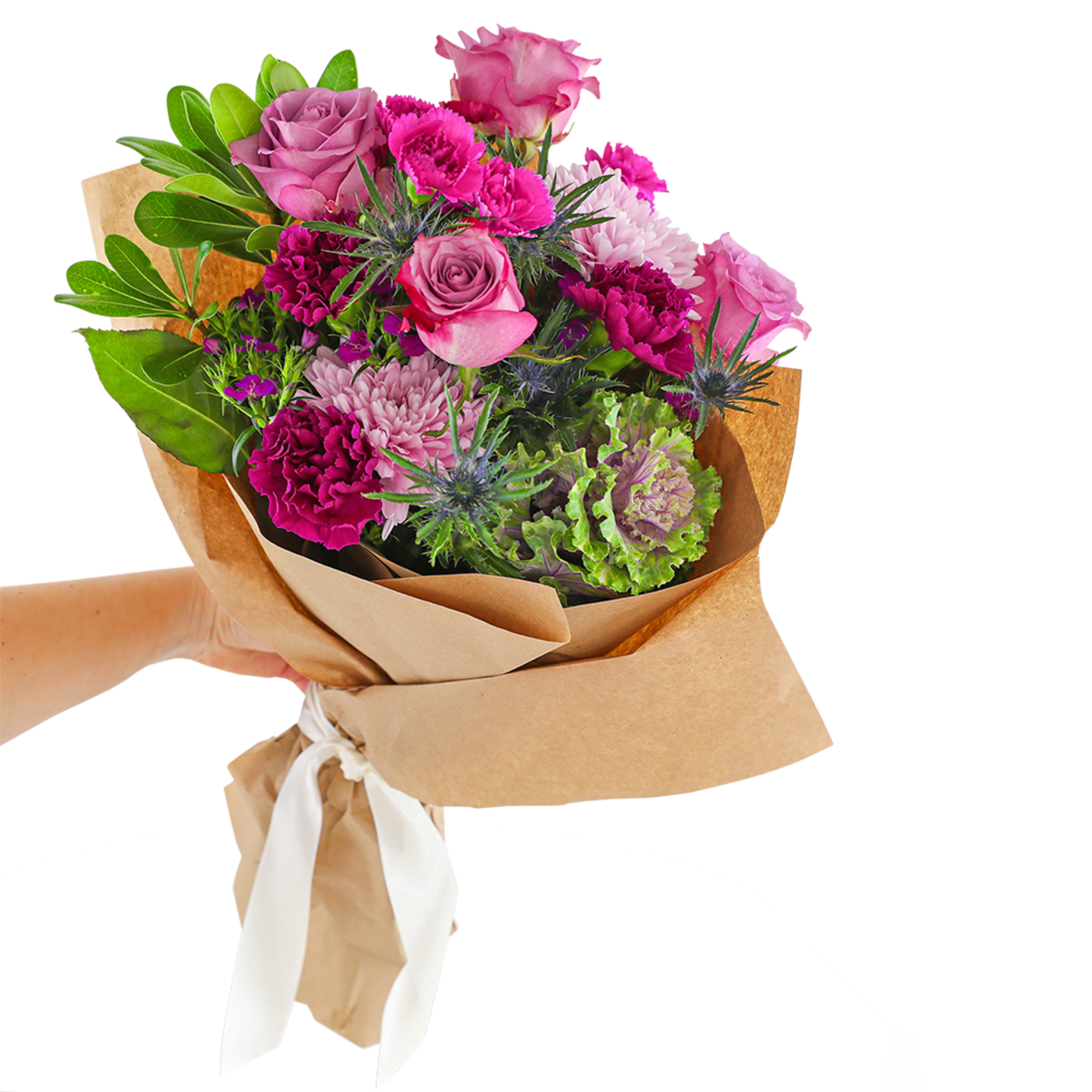 Hand-tied bouquet of pink roses and carnations wrapped in brown paper