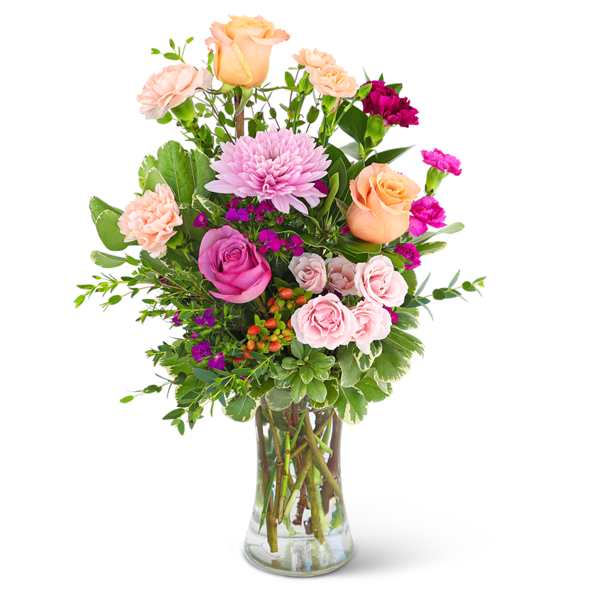 Mixed pink and peach flower bouquet in a clear glass vase