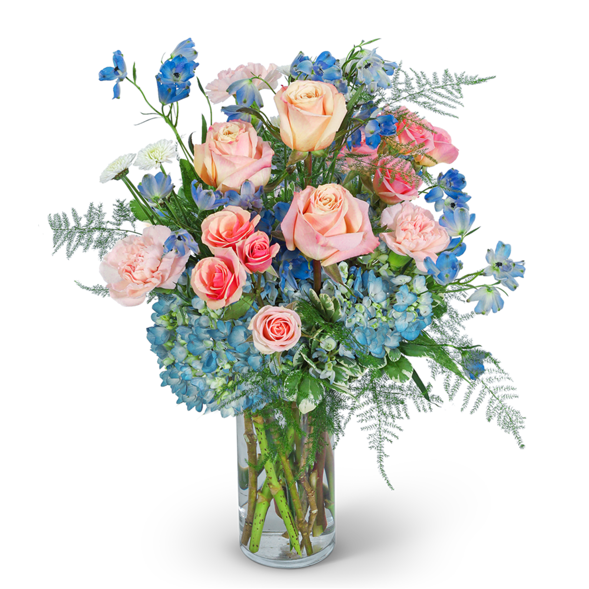 Pink roses and blue flowers arranged in a clear glass vase