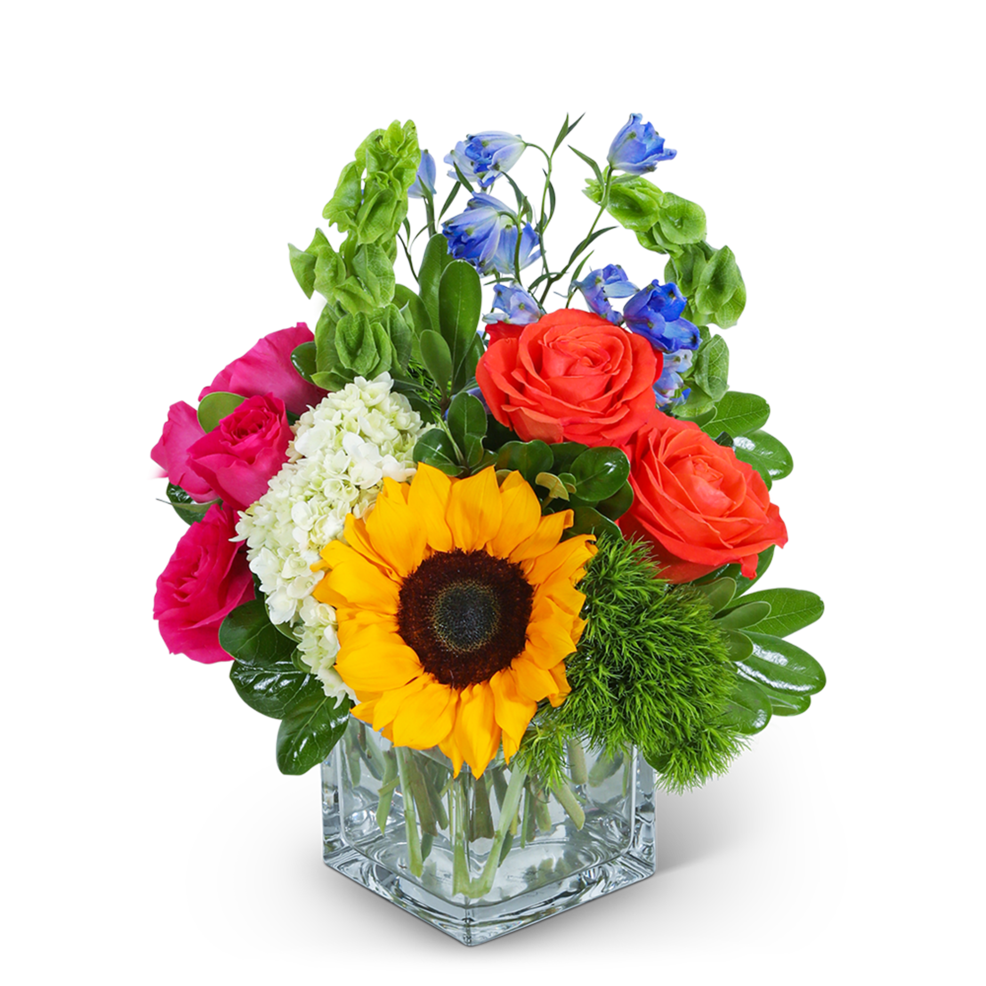 Colorful bouquet with sunflowers, roses, and blue flowers in a glass vase