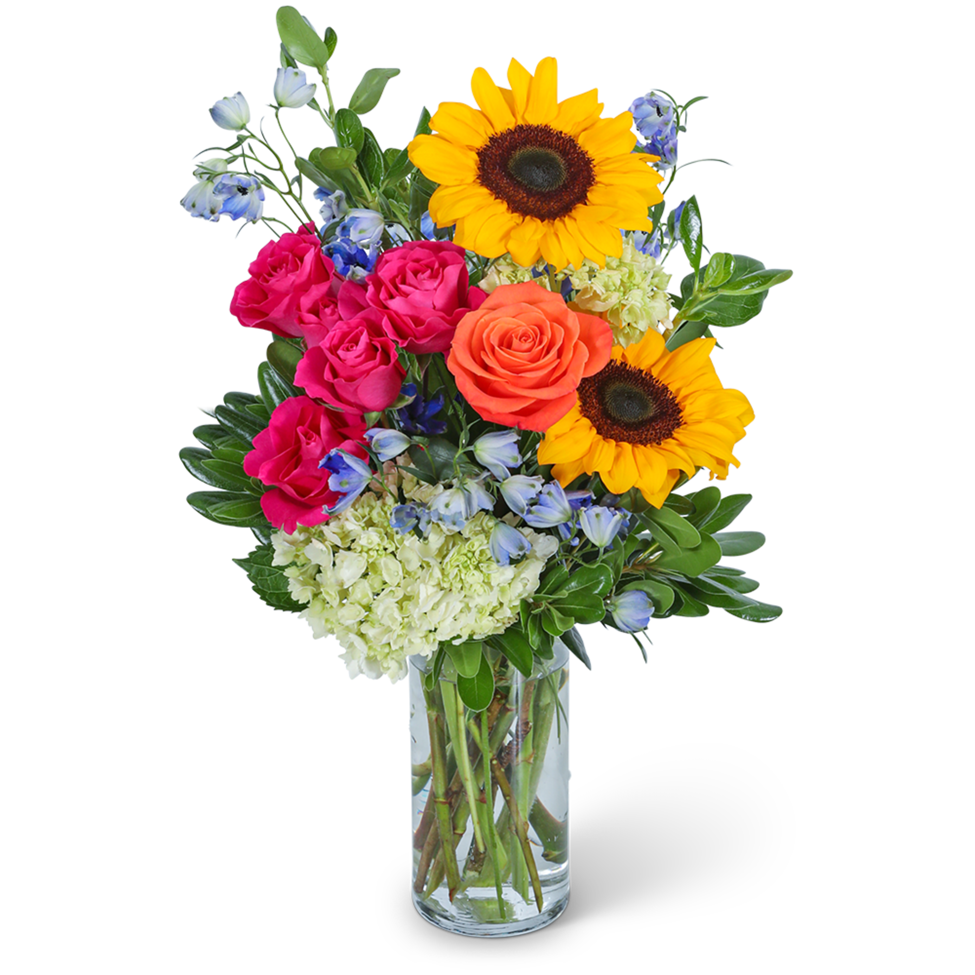 Bouquet of sunflowers, roses, and blue flowers in a clear glass vase