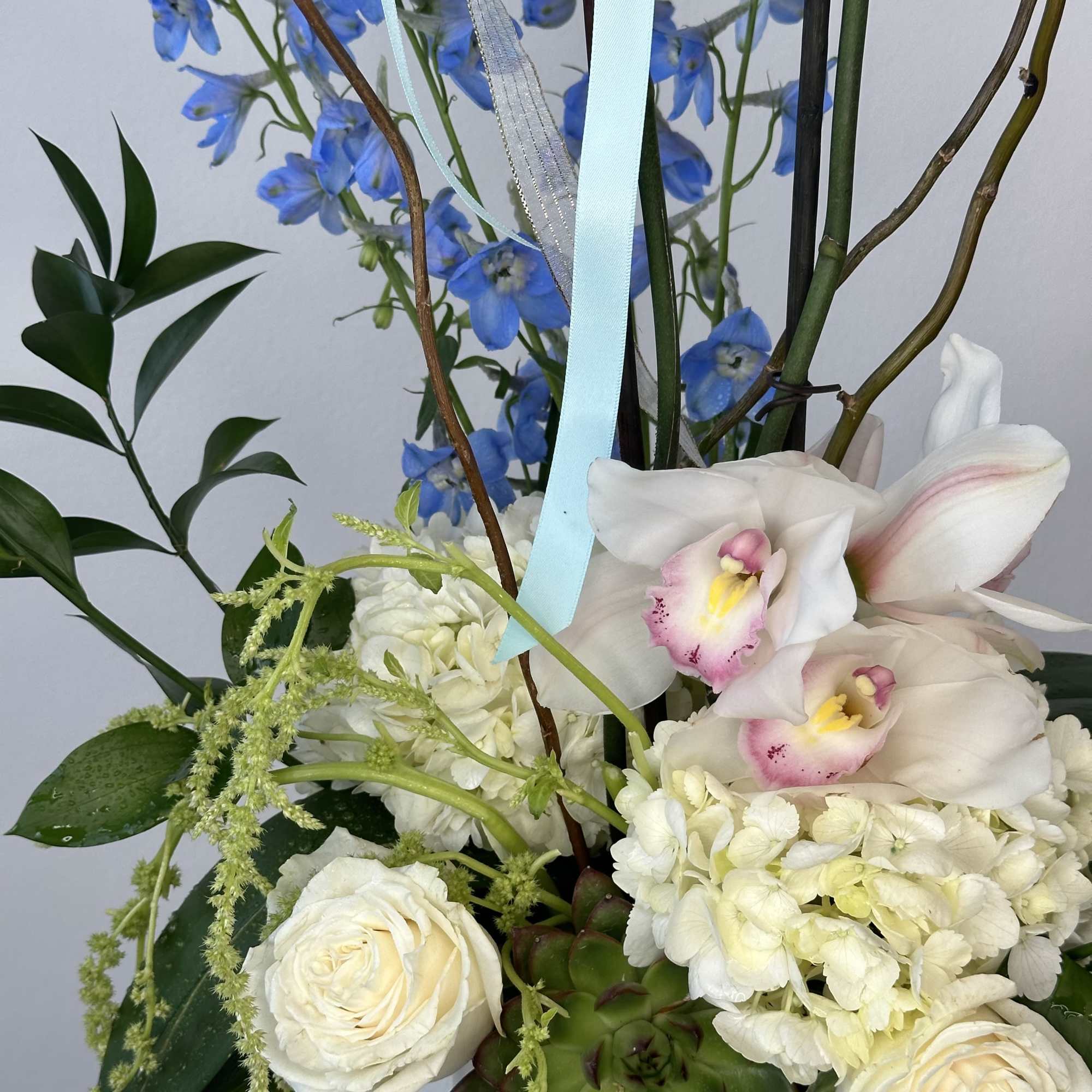 Step into paradise with "Eden," an exquisite luxury orchid arrangement that captures