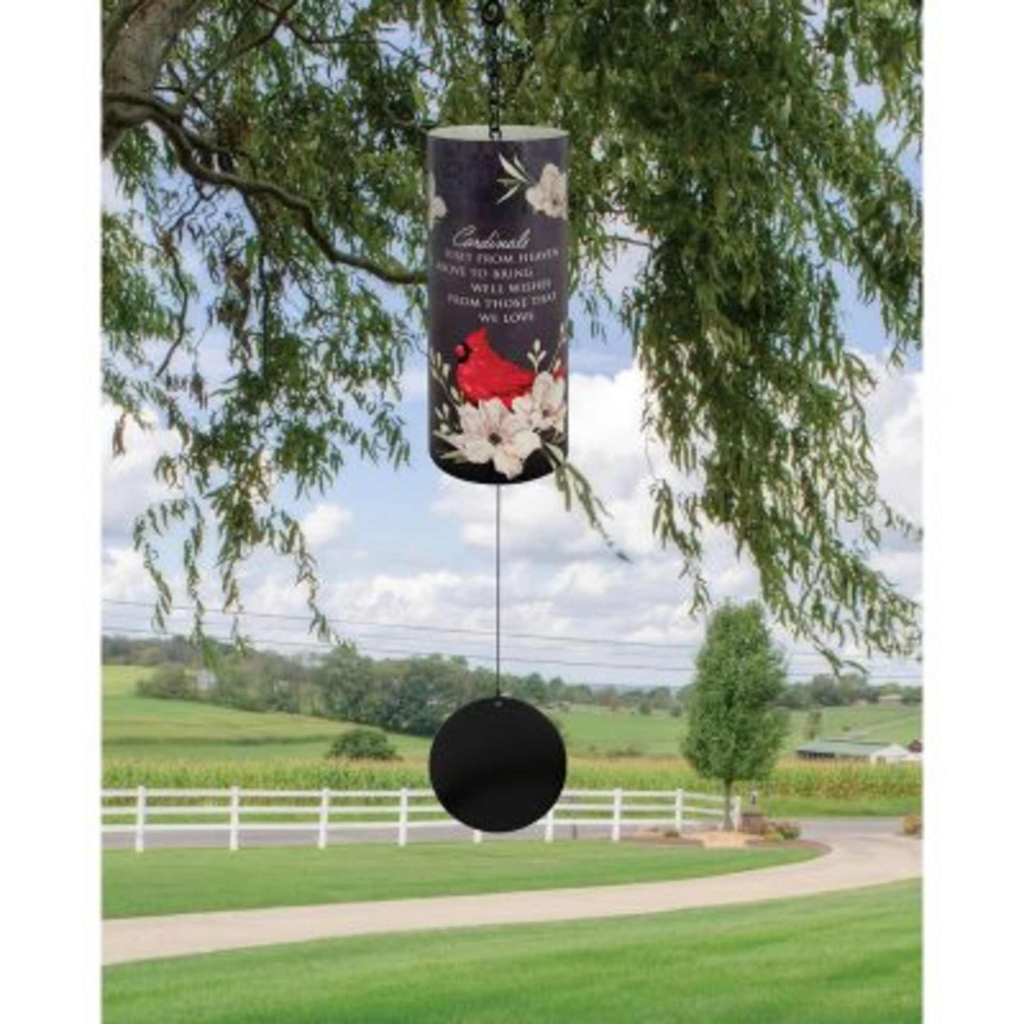 Hanging memorial wind chime with floral decoration and a black round clapper