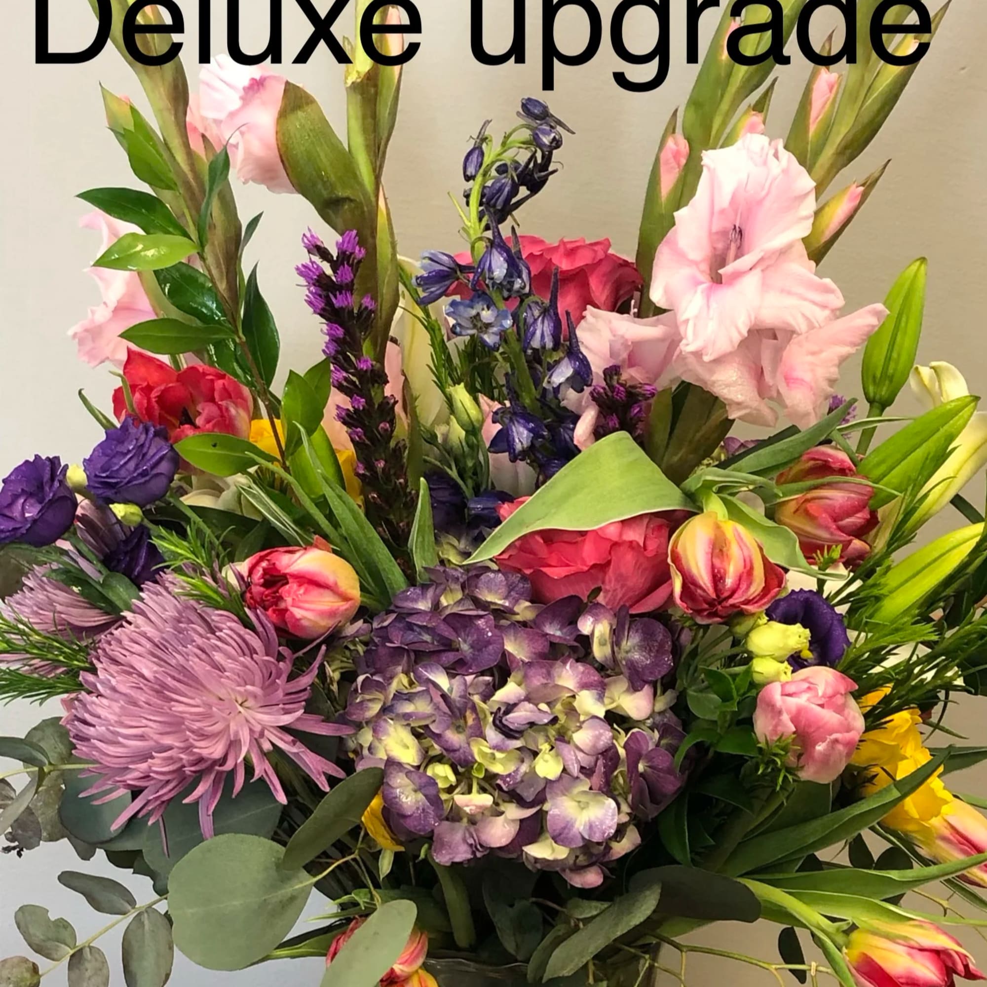Colorful mixed bouquet with pink, purple, and yellow flowers