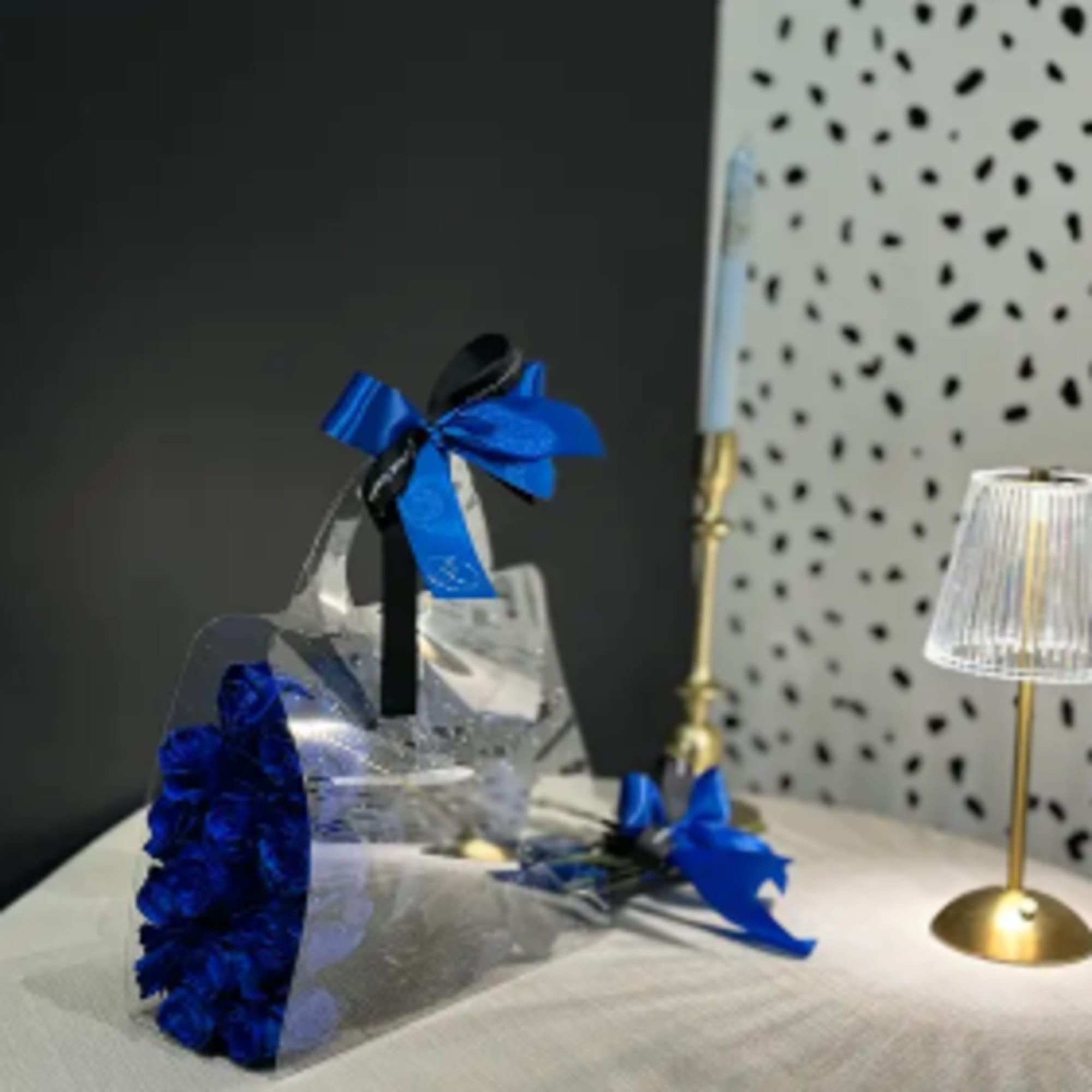 A stunning bouquet of blue roses, designed to stand out with its, photo 2 of 2