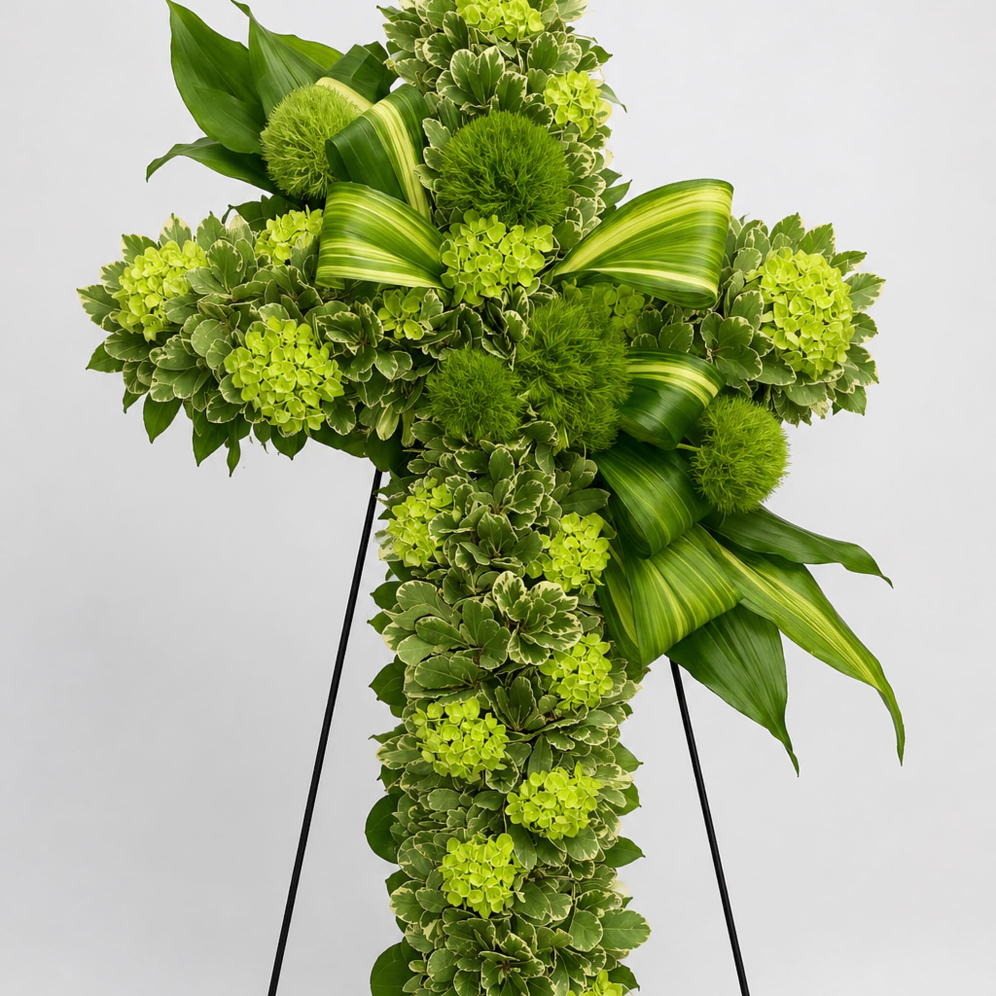 Renewal is a contemporary floral cross that celebrates hope, remembrance, and the