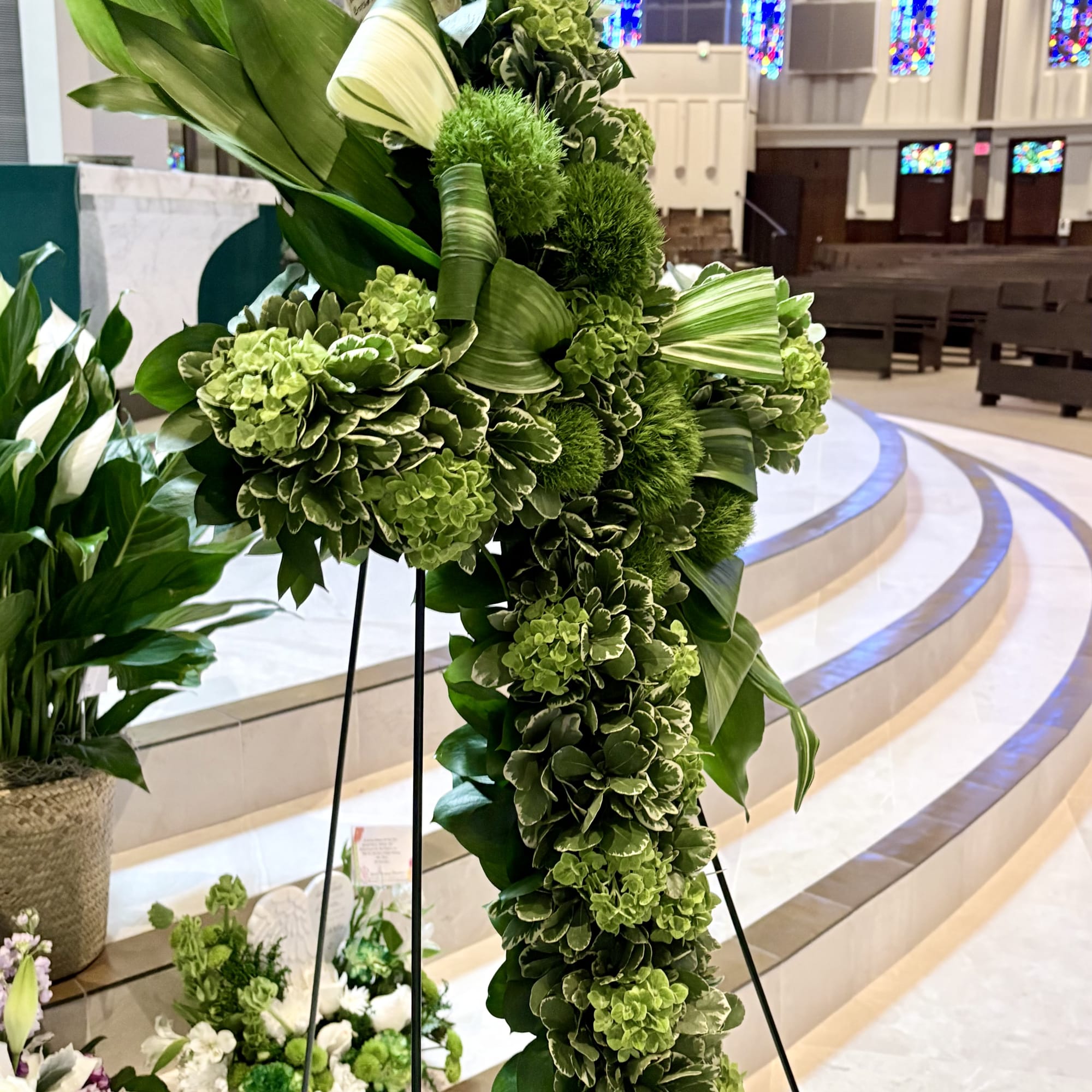 Renewal is a contemporary floral cross that celebrates hope, remembrance, and the, photo 2 of 2