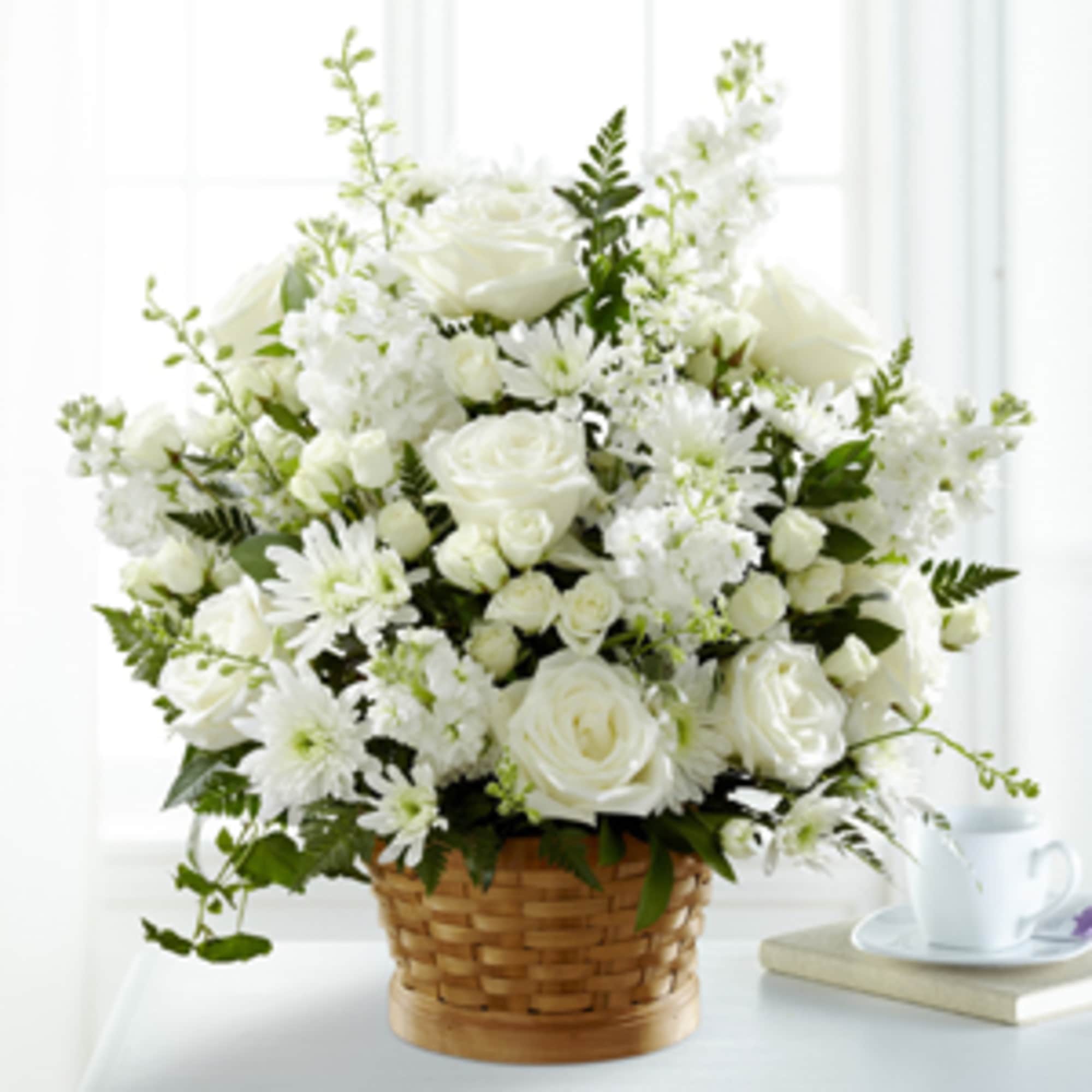 White flowers arranged in a wicker basket