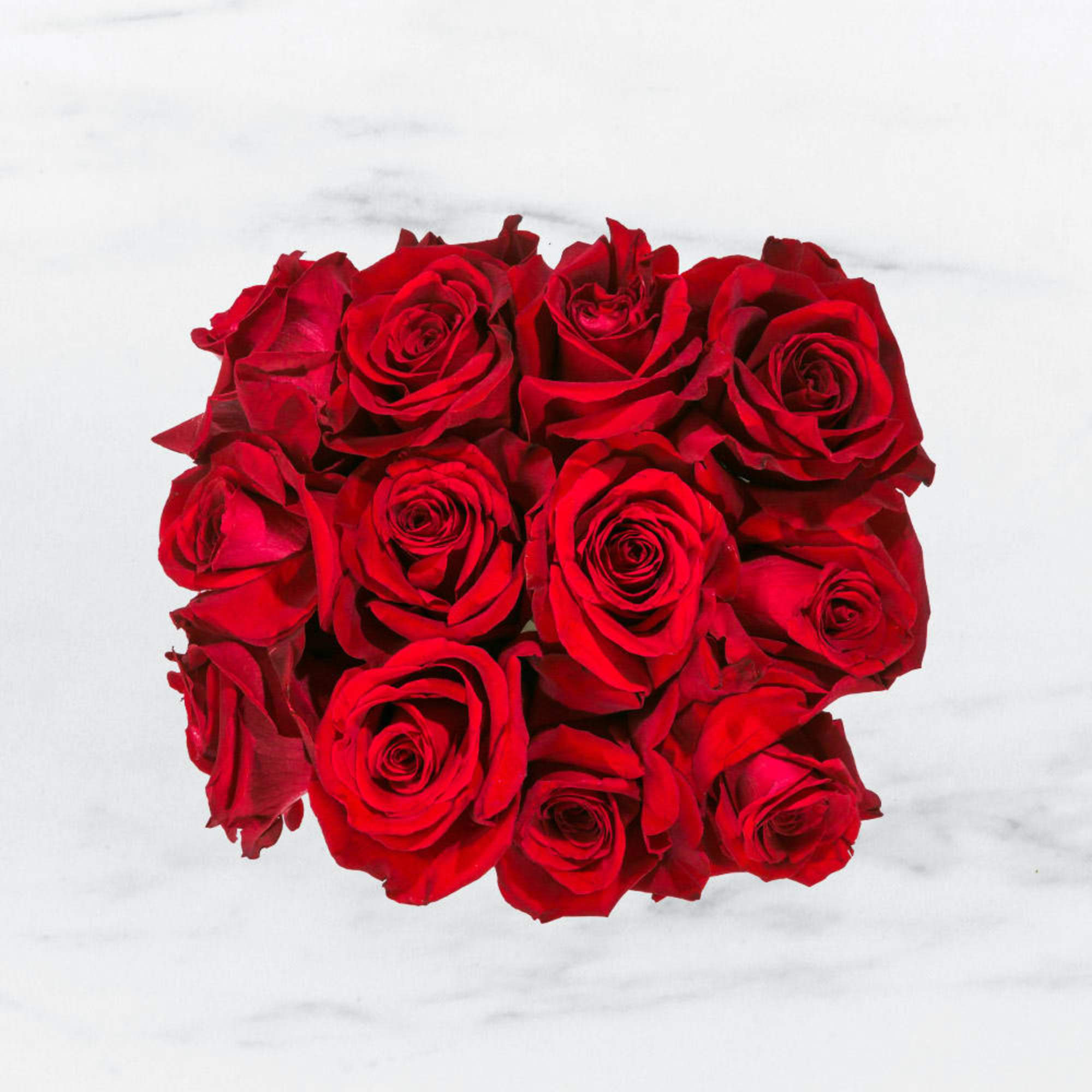 This bold yet tasteful bouquet is the perfect size for any desk.