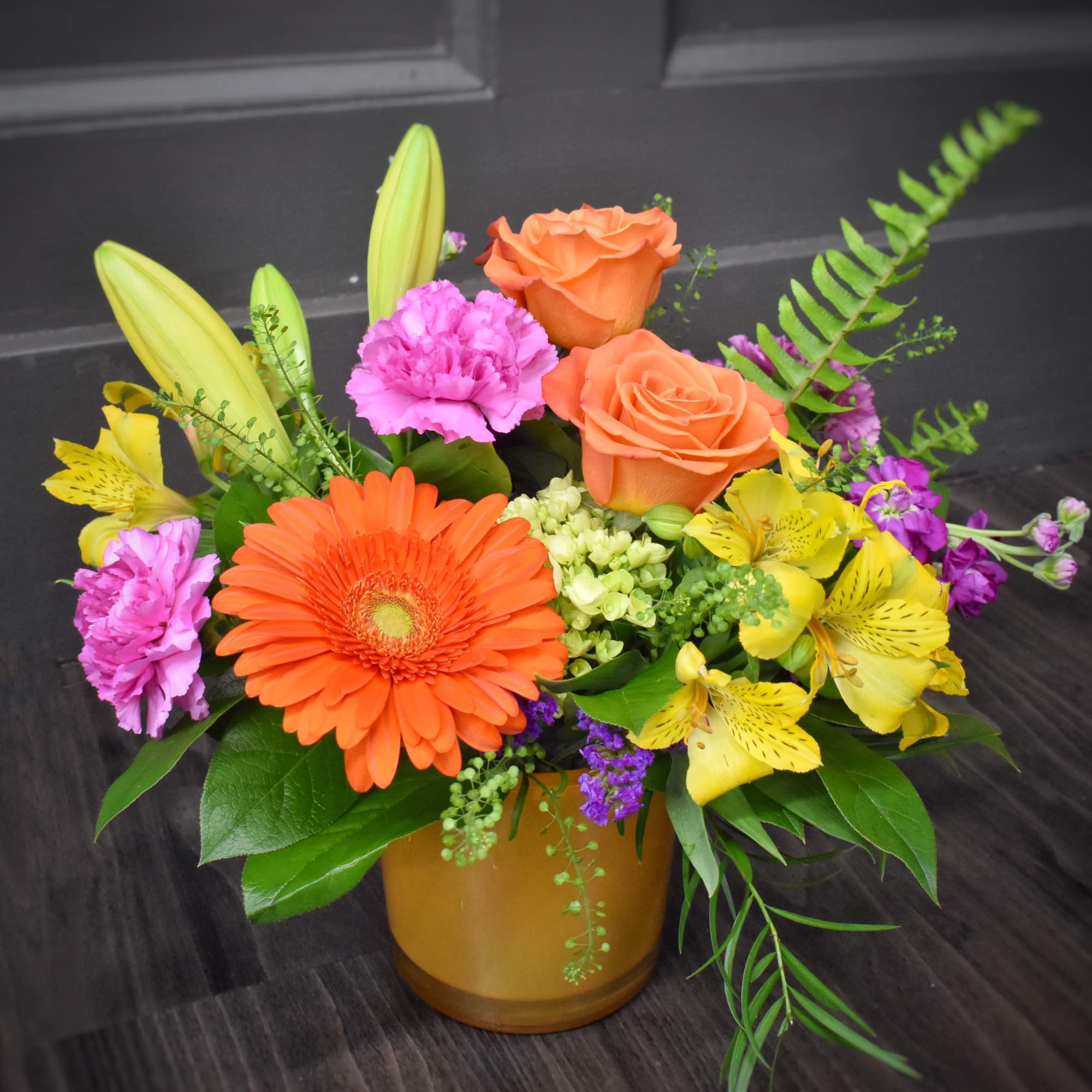 A bright, garden-style bouquet that reads like sunshine in bloom-Calypso is a
