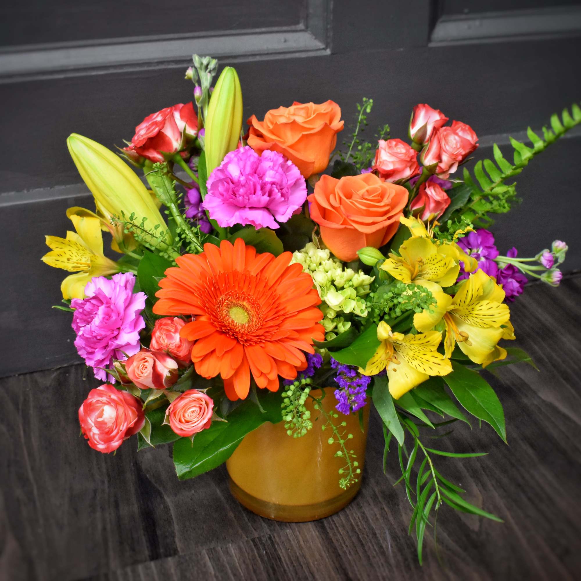 A bright, garden-style bouquet that reads like sunshine in bloom-Calypso is a