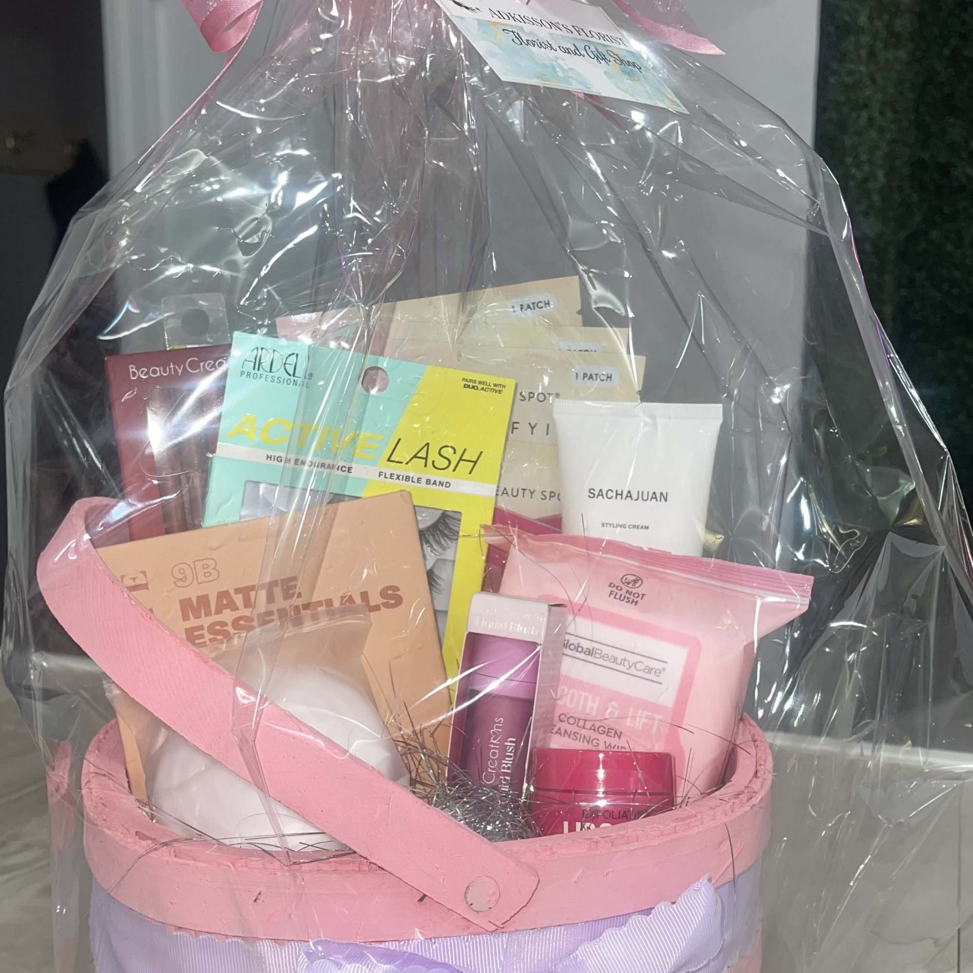 Soft pastels and pampering treats make this Makeup Lover Gift Basket an