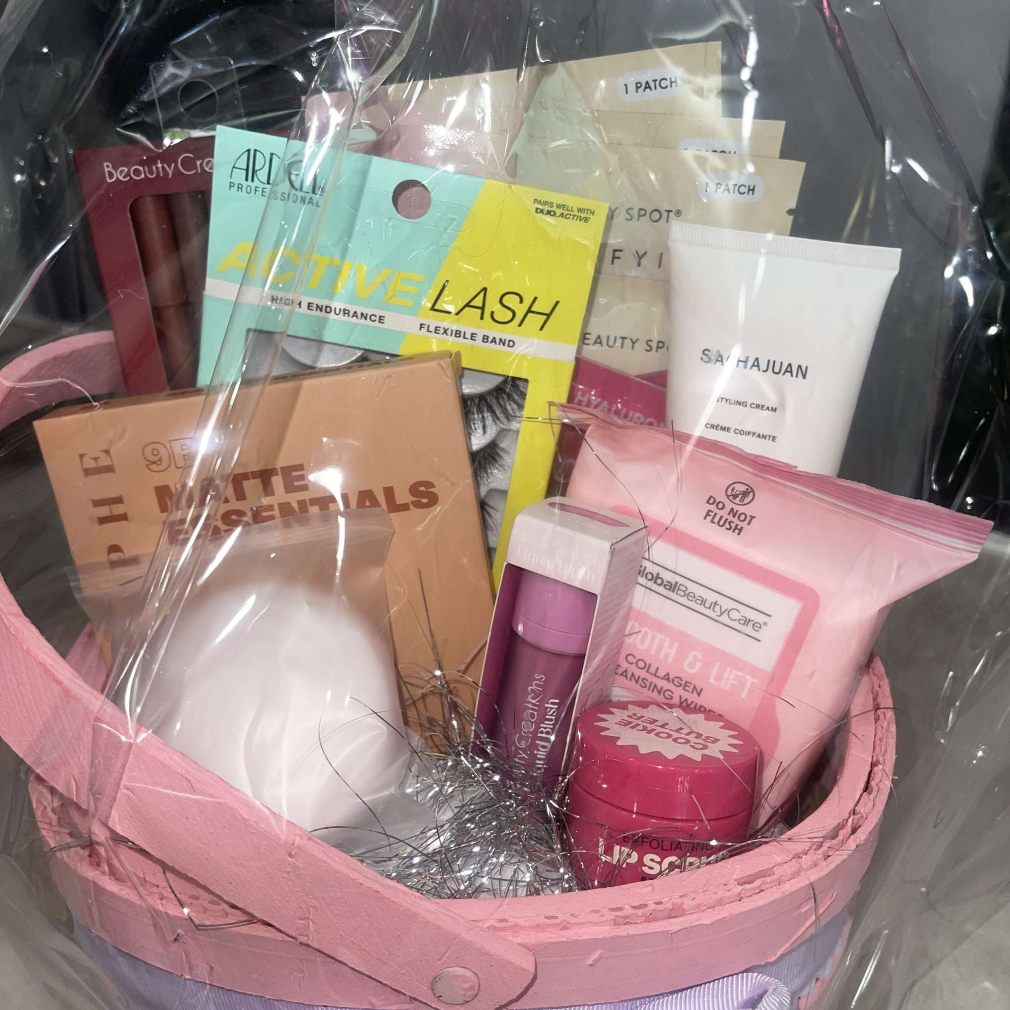 Soft pastels and pampering treats make this Makeup Lover Gift Basket an