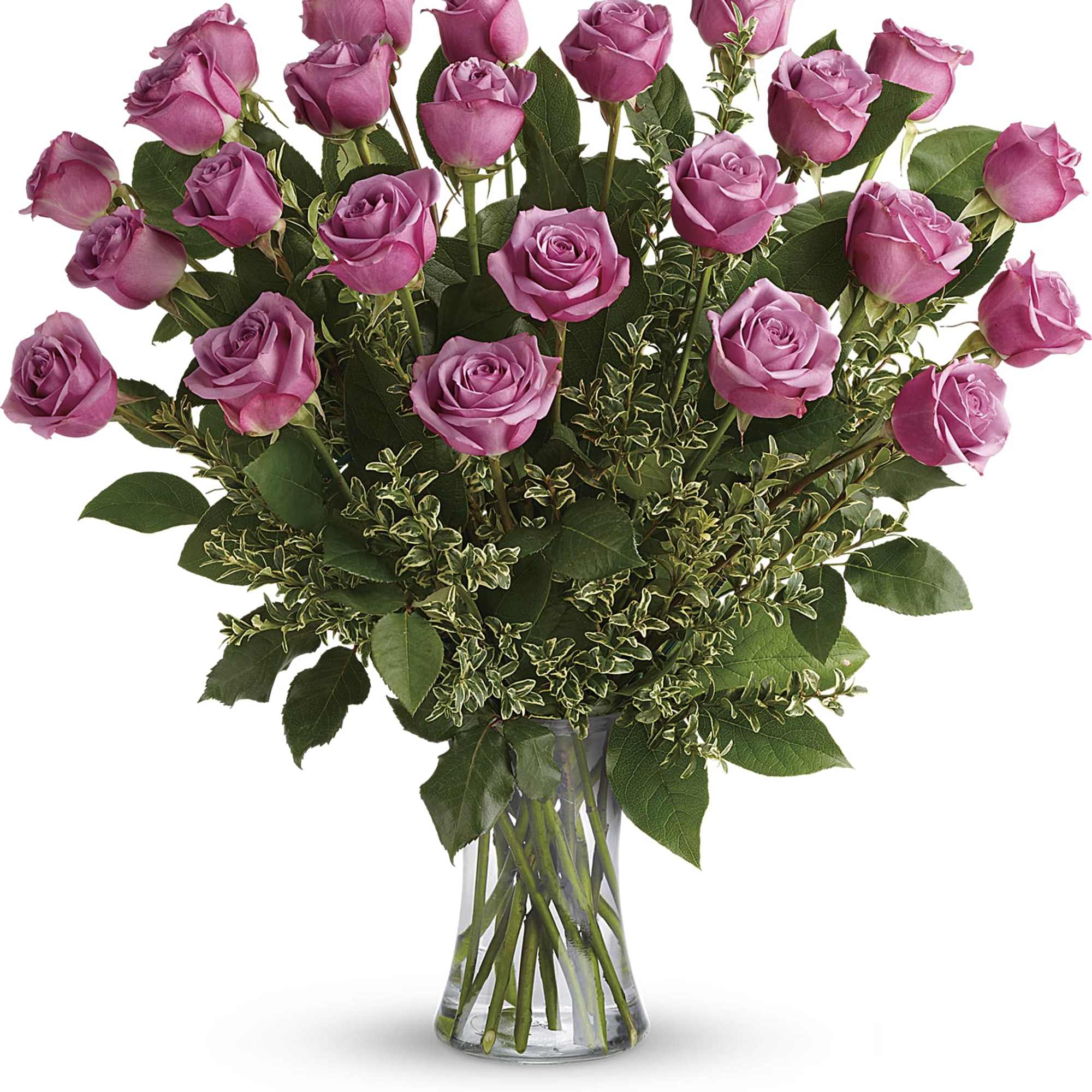 Pink roses arranged in a clear glass vase