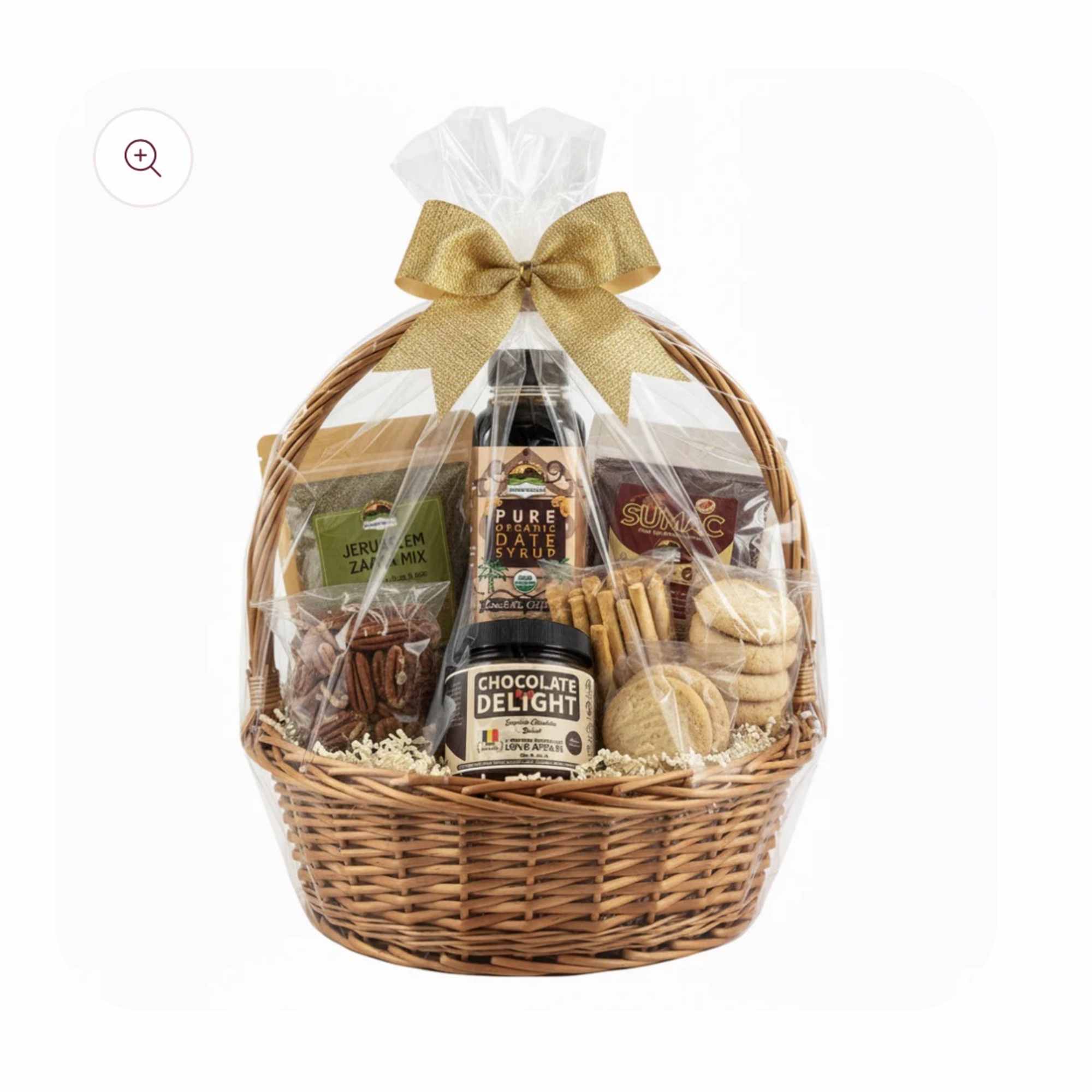 Gift basket with cookies, chocolate spread, and packaged snacks tied with a gold bow