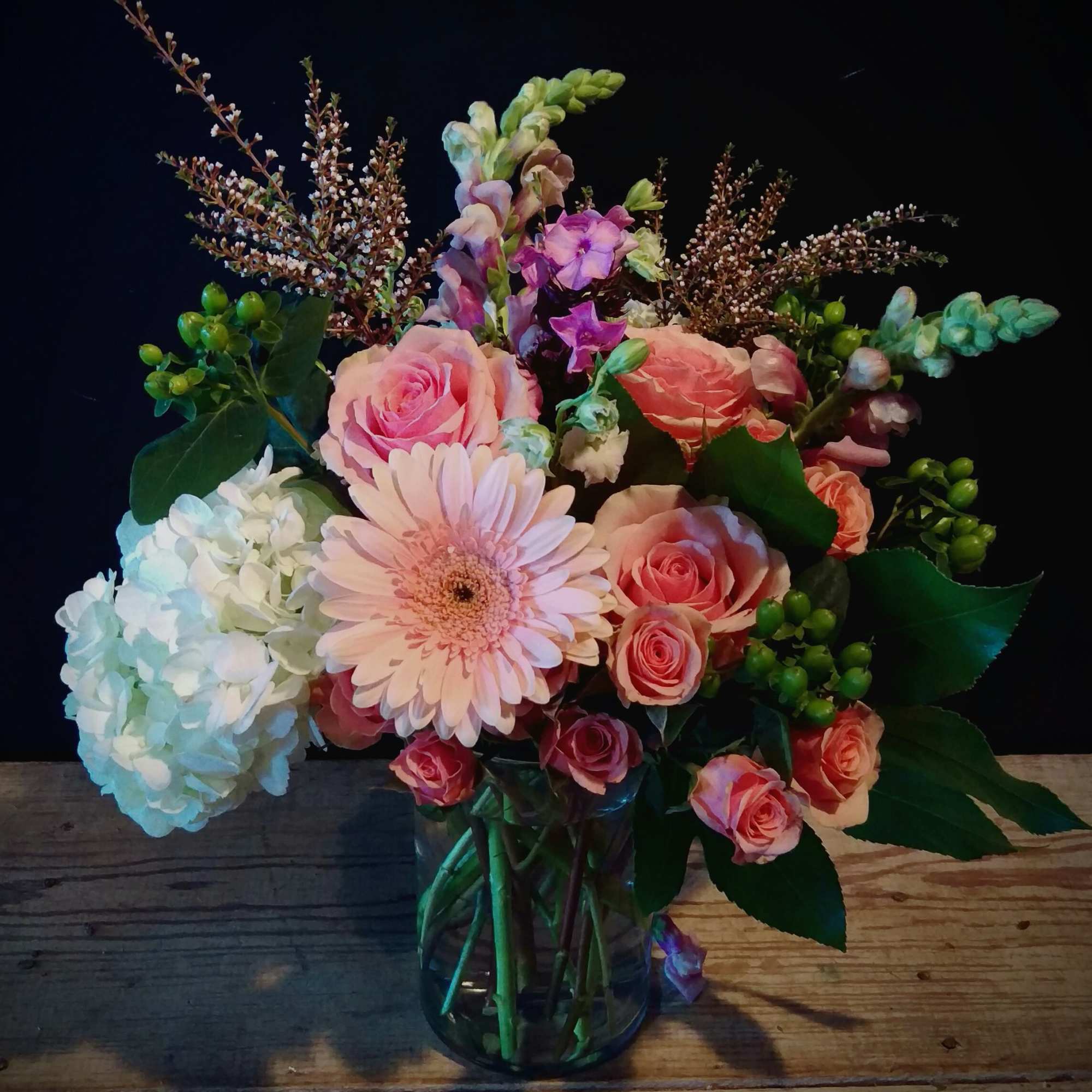 Pink and white mixed bouquet in a glass vase