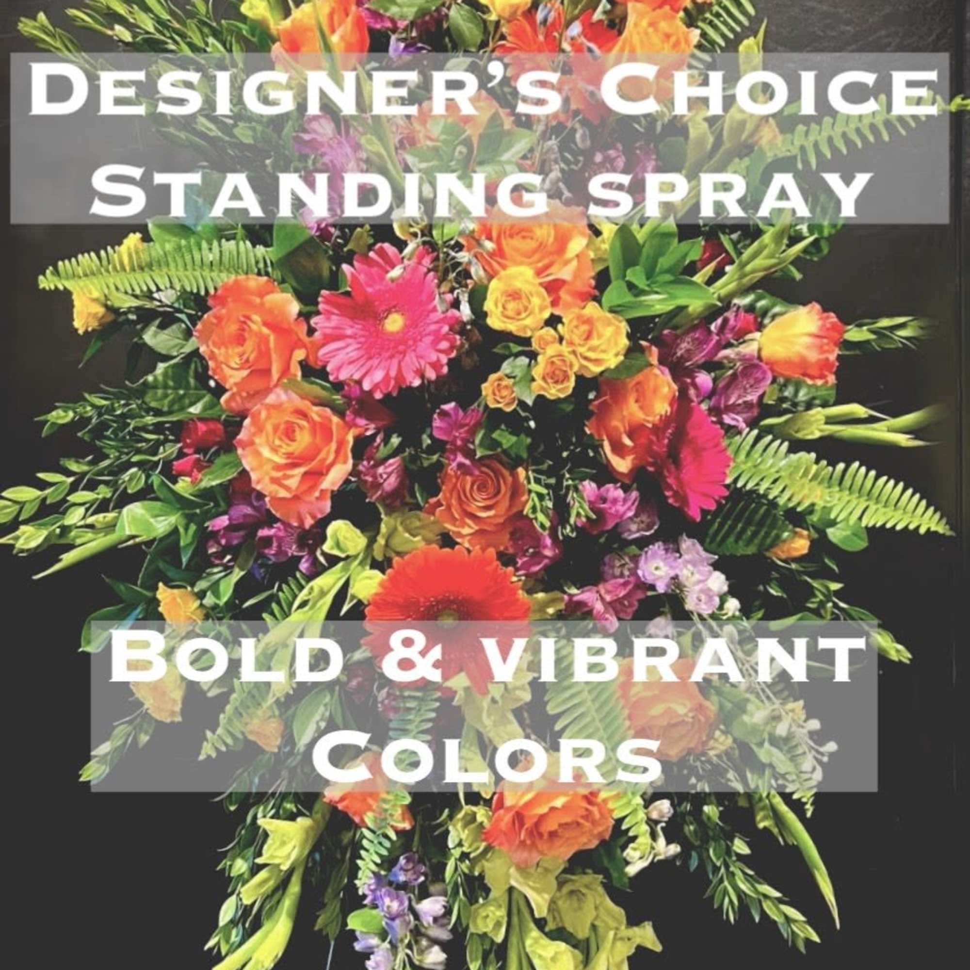 Tall standing spray with orange, pink, yellow, and purple flowers
