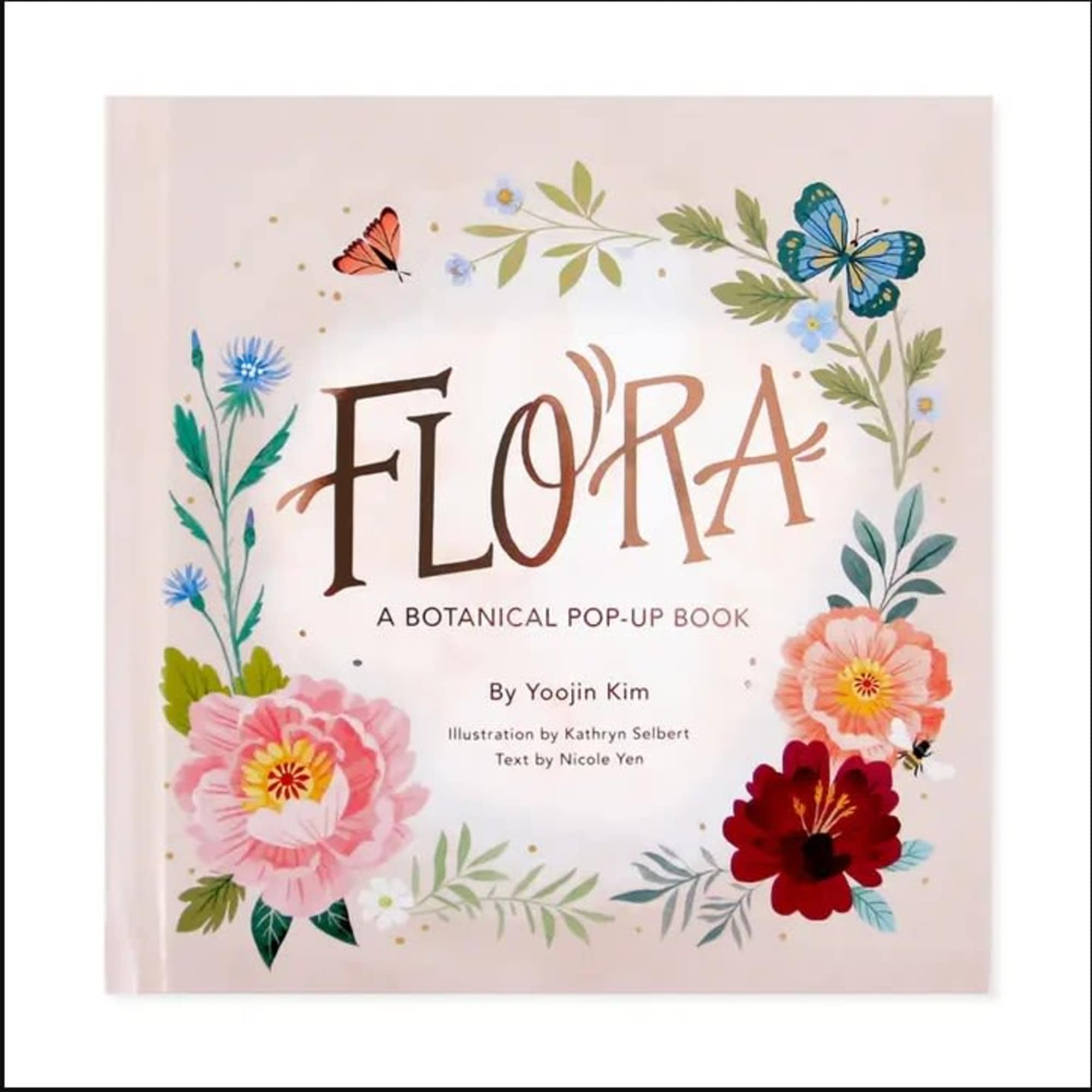 Botanical pop-up book cover with illustrated flowers and butterflies