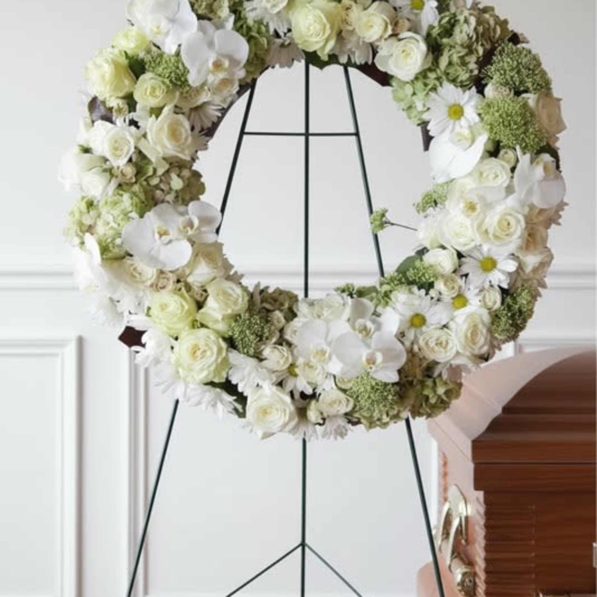 A lush gathering of premium flowers like roses, hydrangea and orchids... all