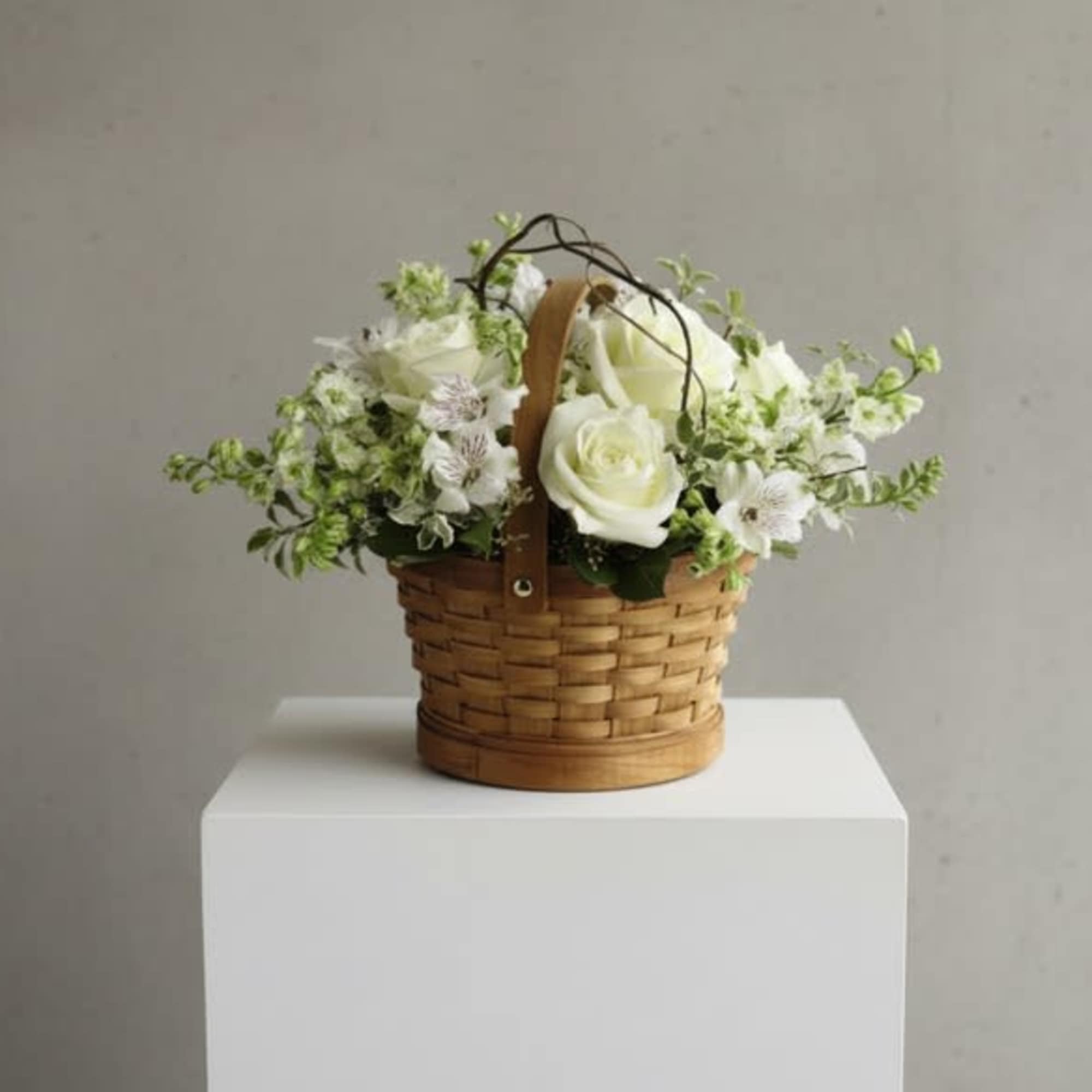 The Peaceful Garden Basket offers warmth and comfort through its display of
