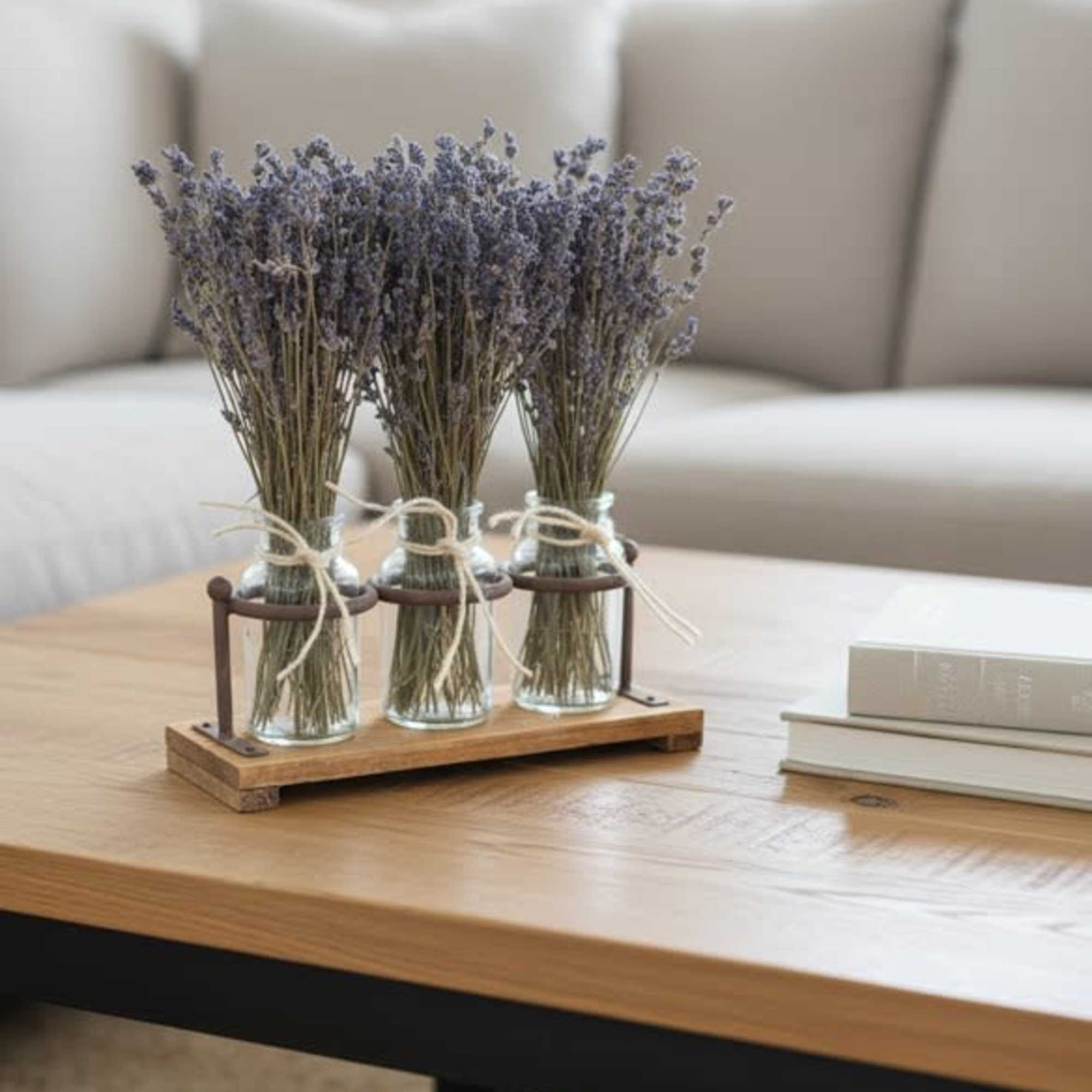 A trio of dried lavender bundles in a keepsake container of wood