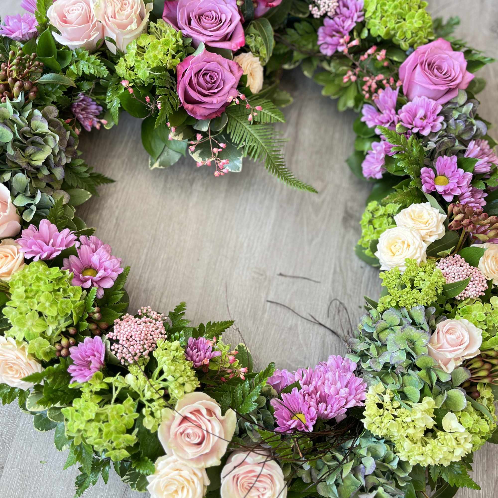 This gorgeous memorial wreath is a stunning way to send your expression, photo 2 of 2