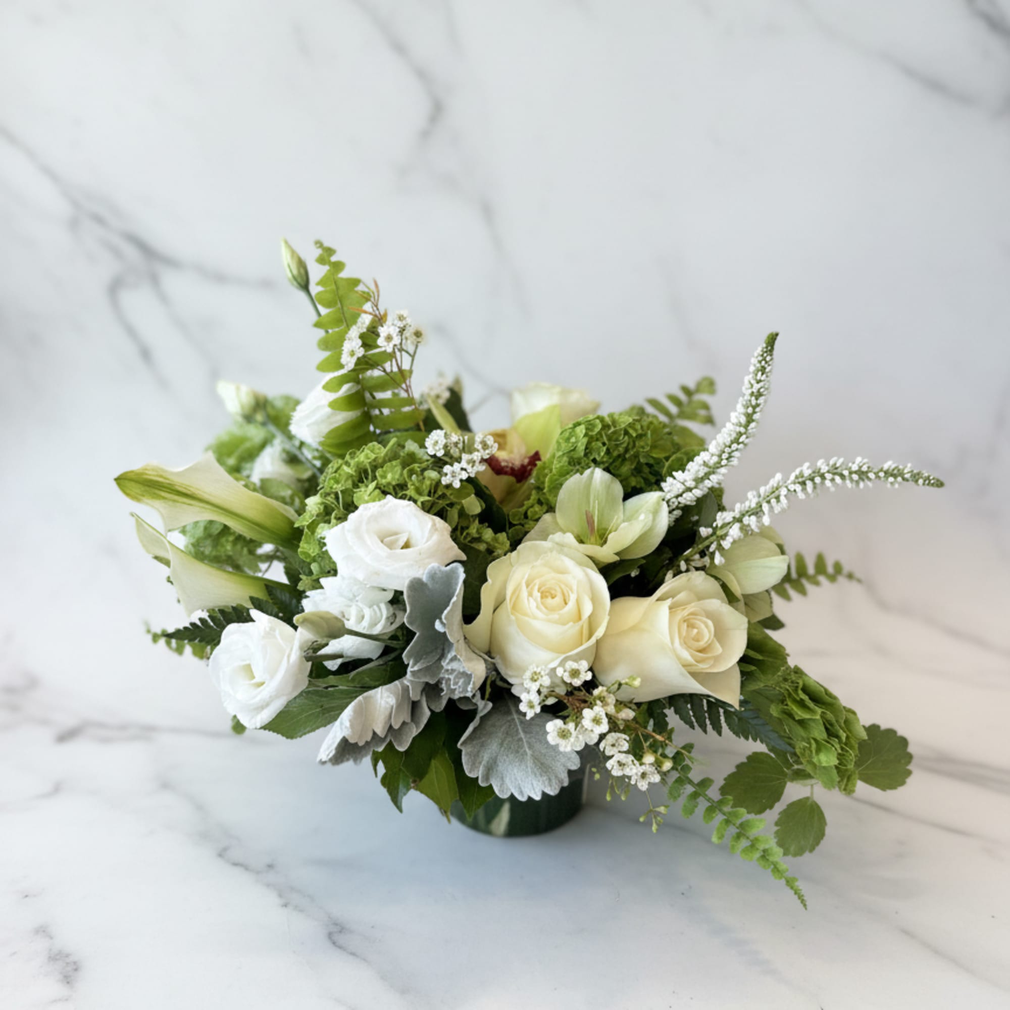 Bright and full of charm, the verdant joy arrangement is a stunning