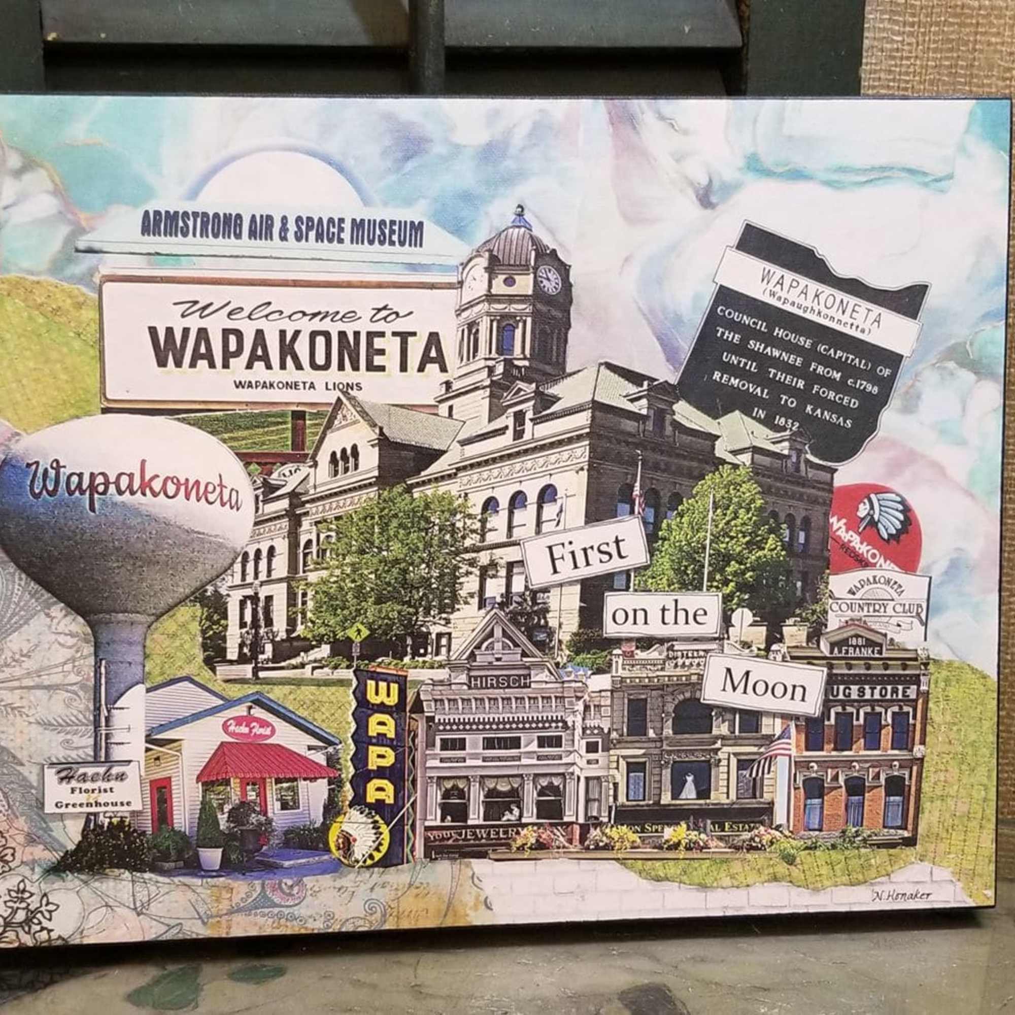 Decorative collage of Wapakoneta landmarks and signs on a canvas panel