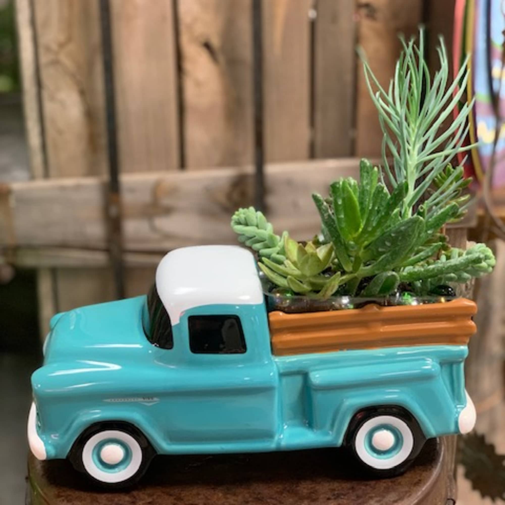 This cute keepsake ceramic vintage truck is filled with a variety of