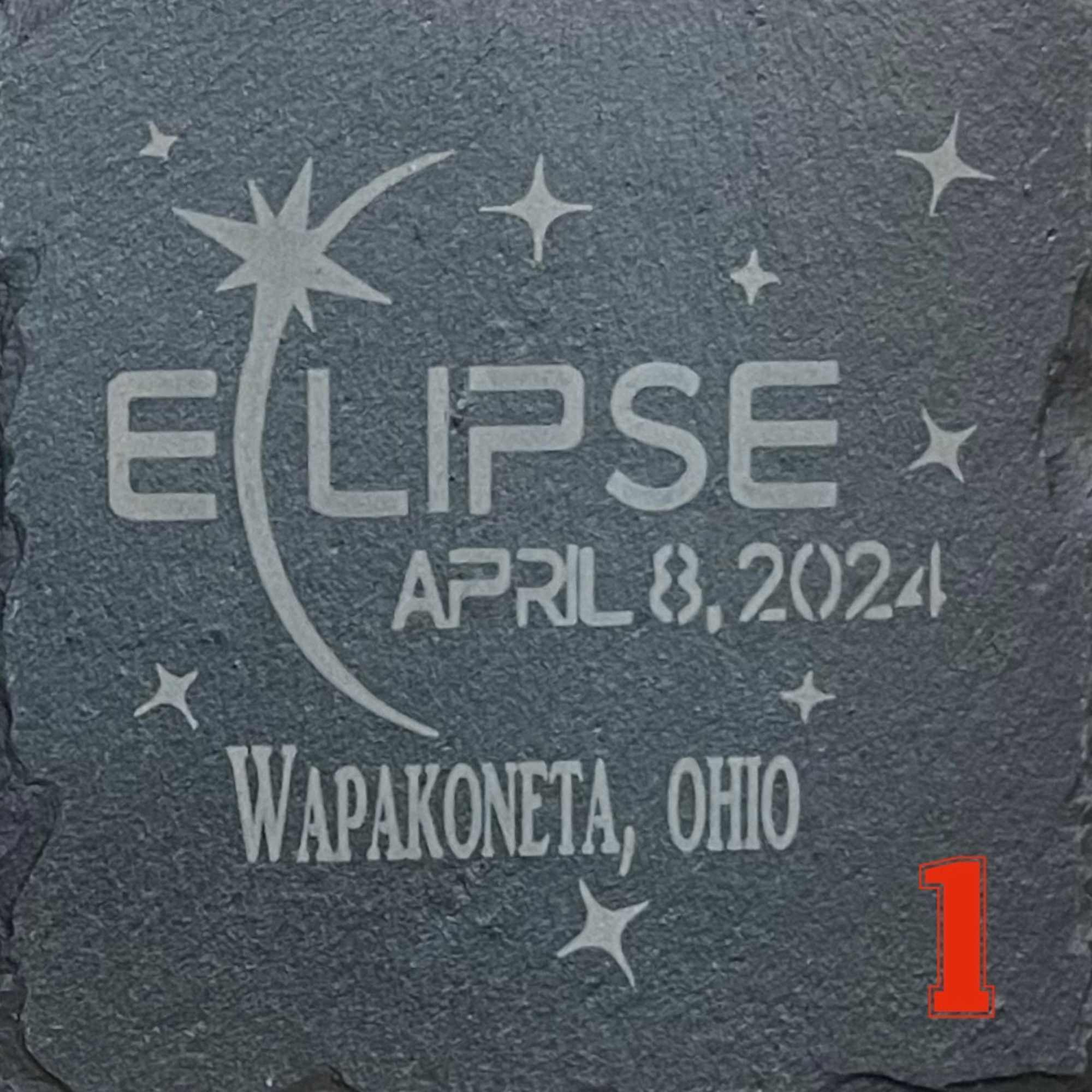Engraved stone plaque with the word ECLIPSE and date April 8, 2024