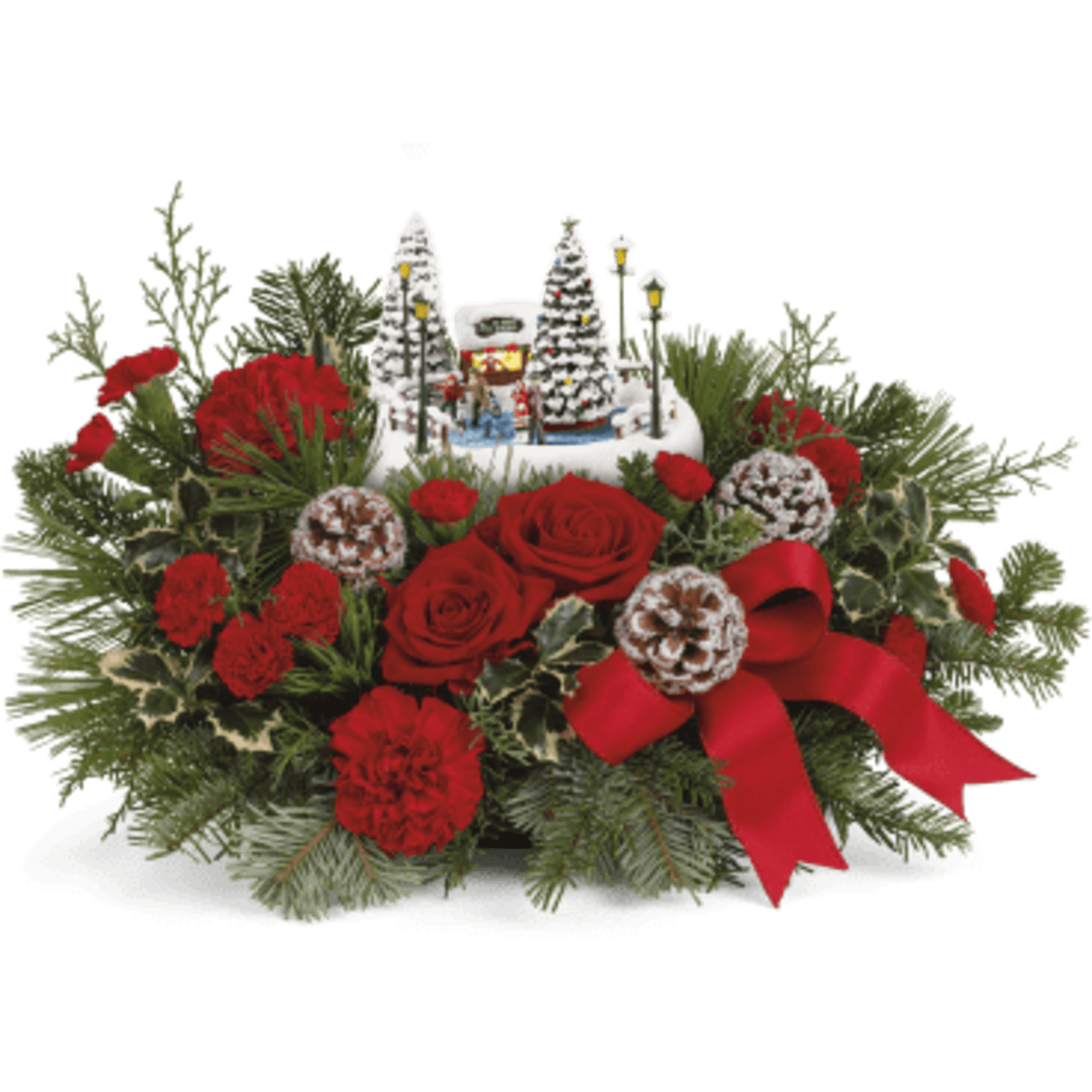 Red roses and carnations with a miniature snowy Christmas village centerpiece
