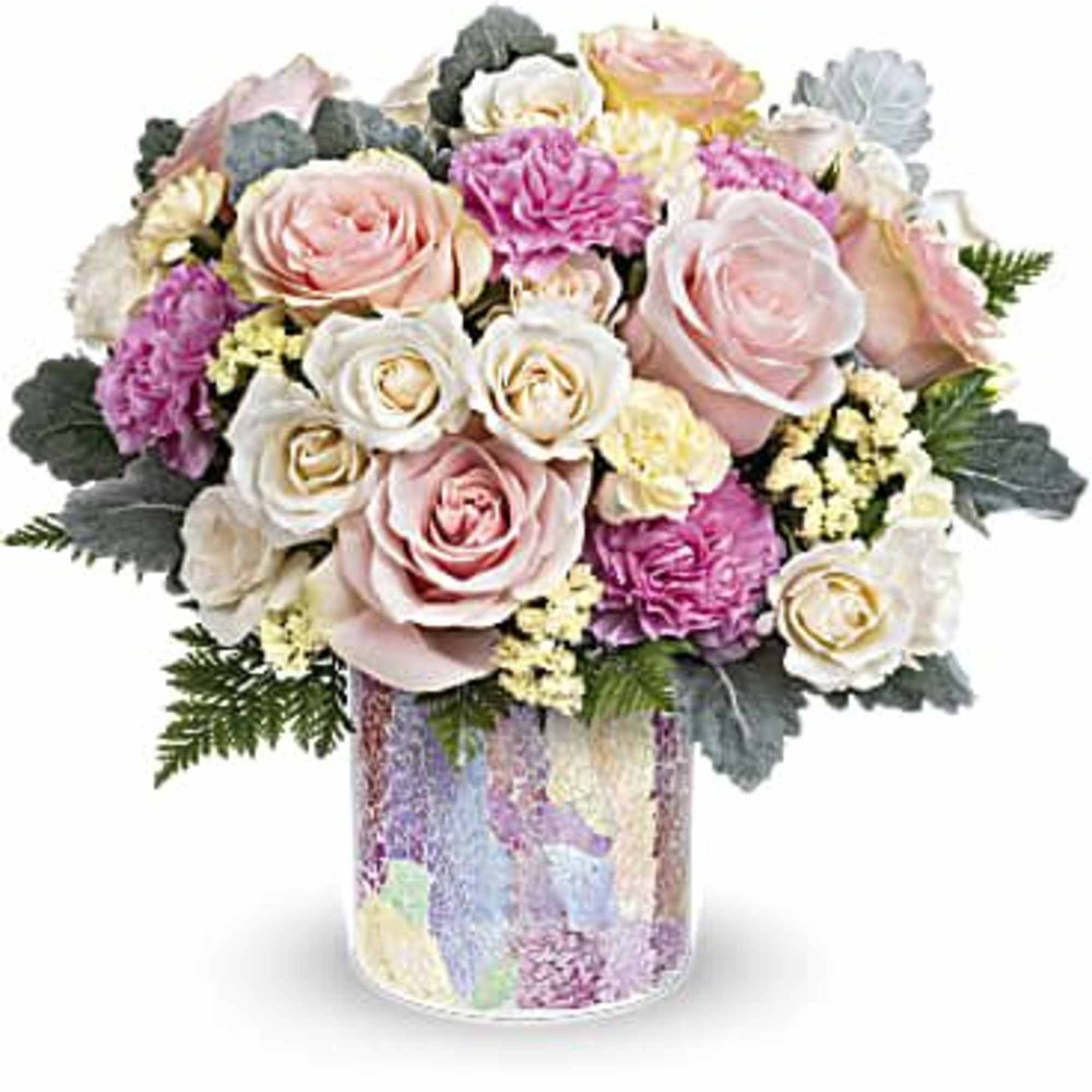 Bouquet of pastel roses and carnations in a patterned glass vase