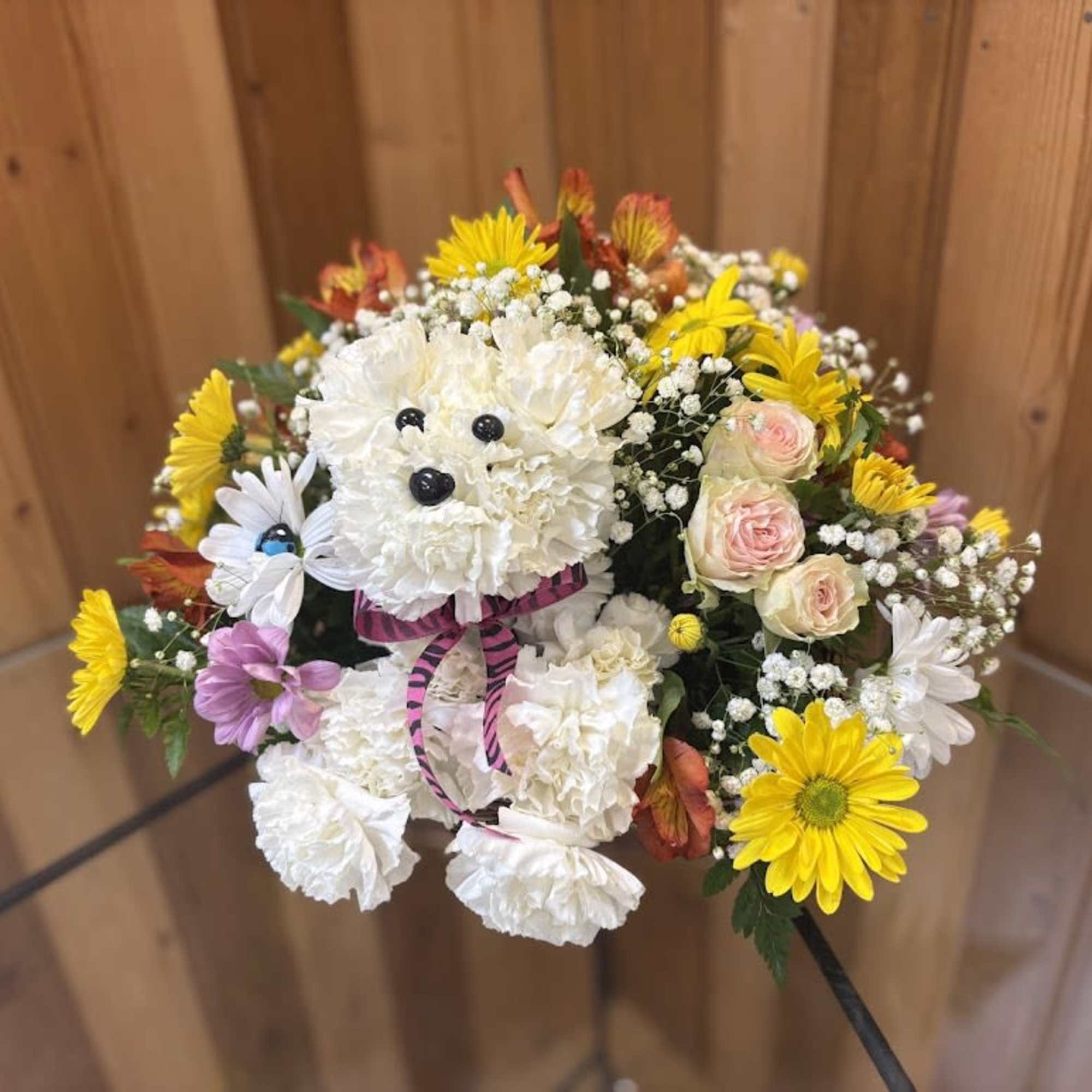 Bouquet with a white teddy bear made of flowers and mixed blooms