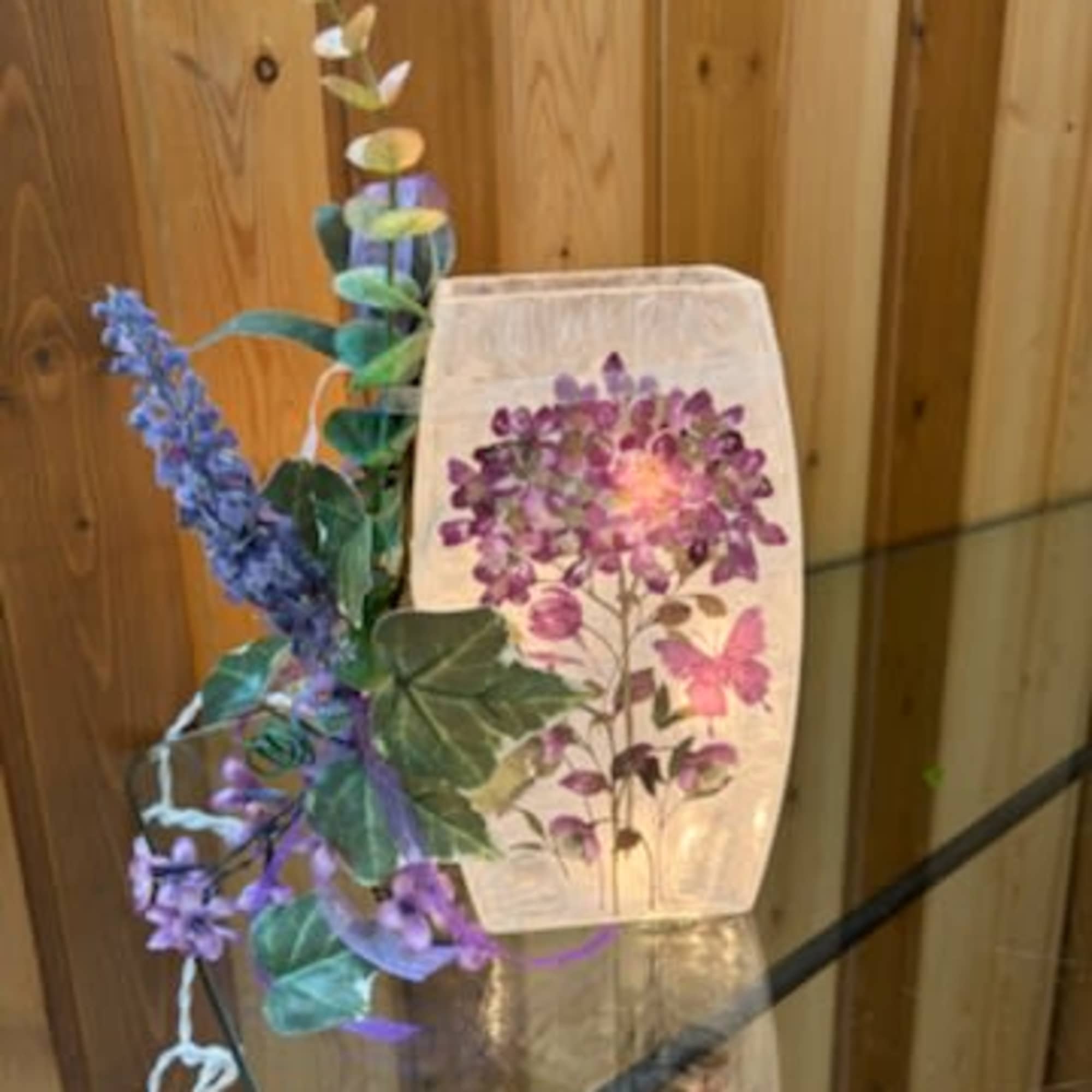 Decorative floral lantern with purple flowers and butterflies