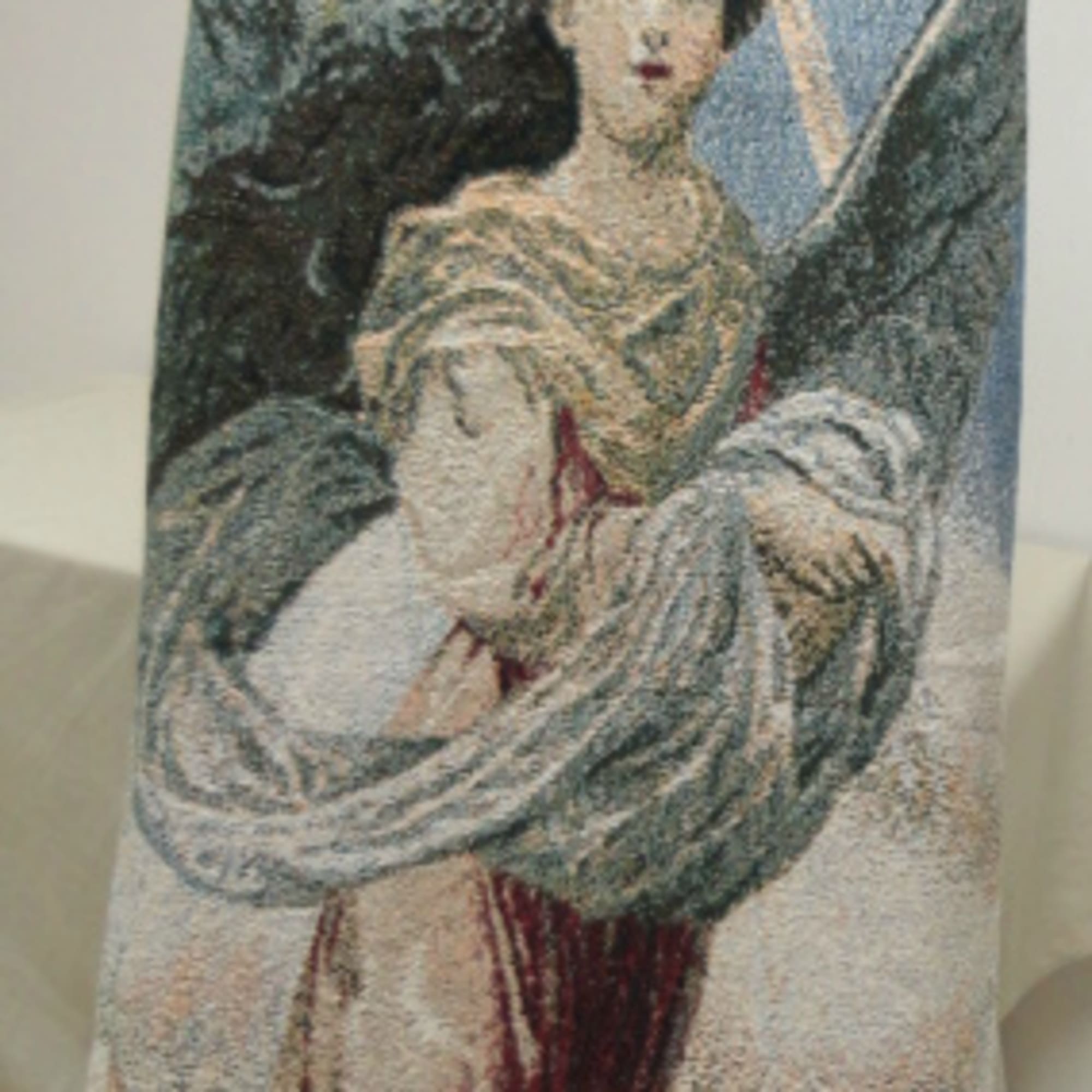 Decorative gift bag with an angel illustration and ribbon bow