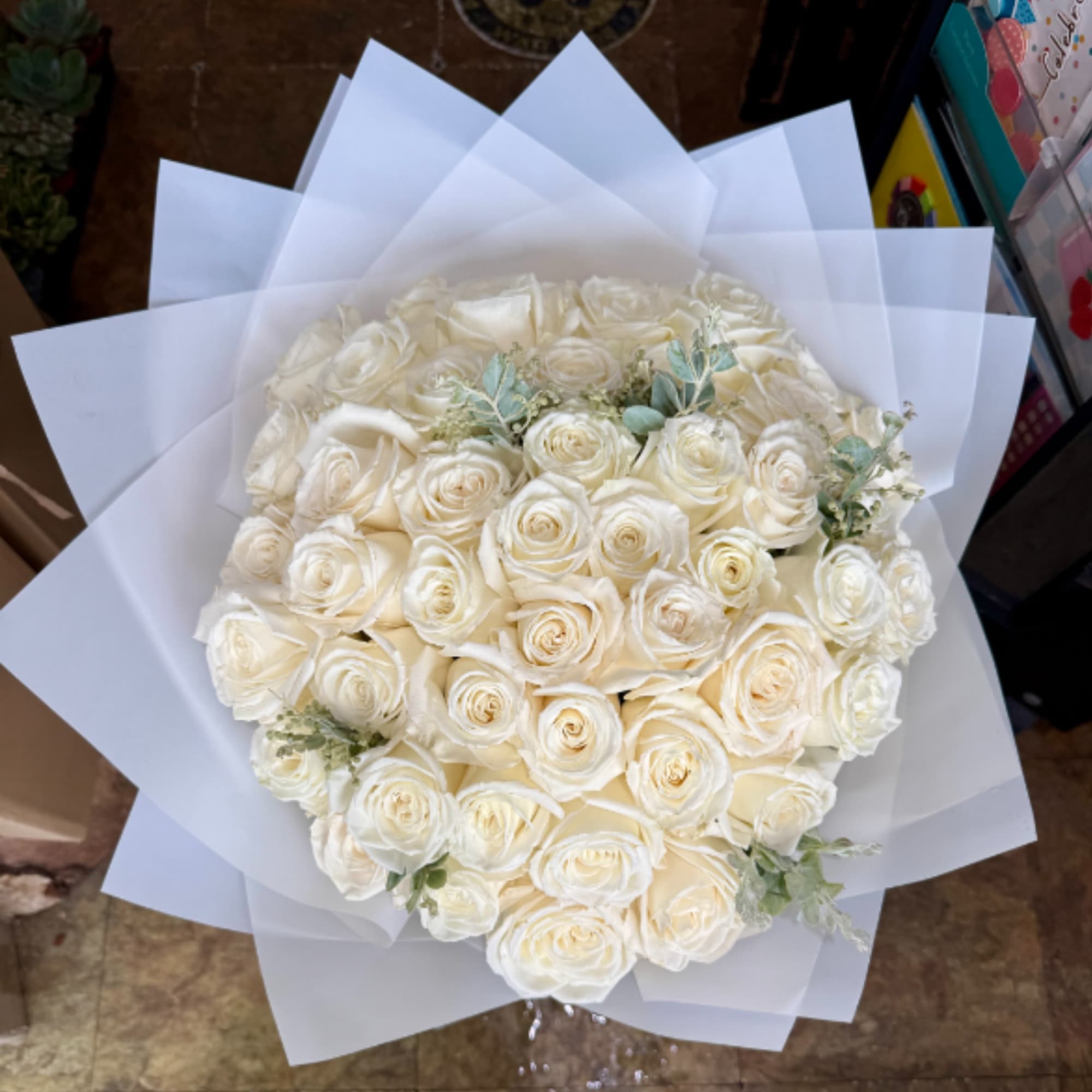This bouquet has a timeless, luxurious feel. An elegant gathering of pristine