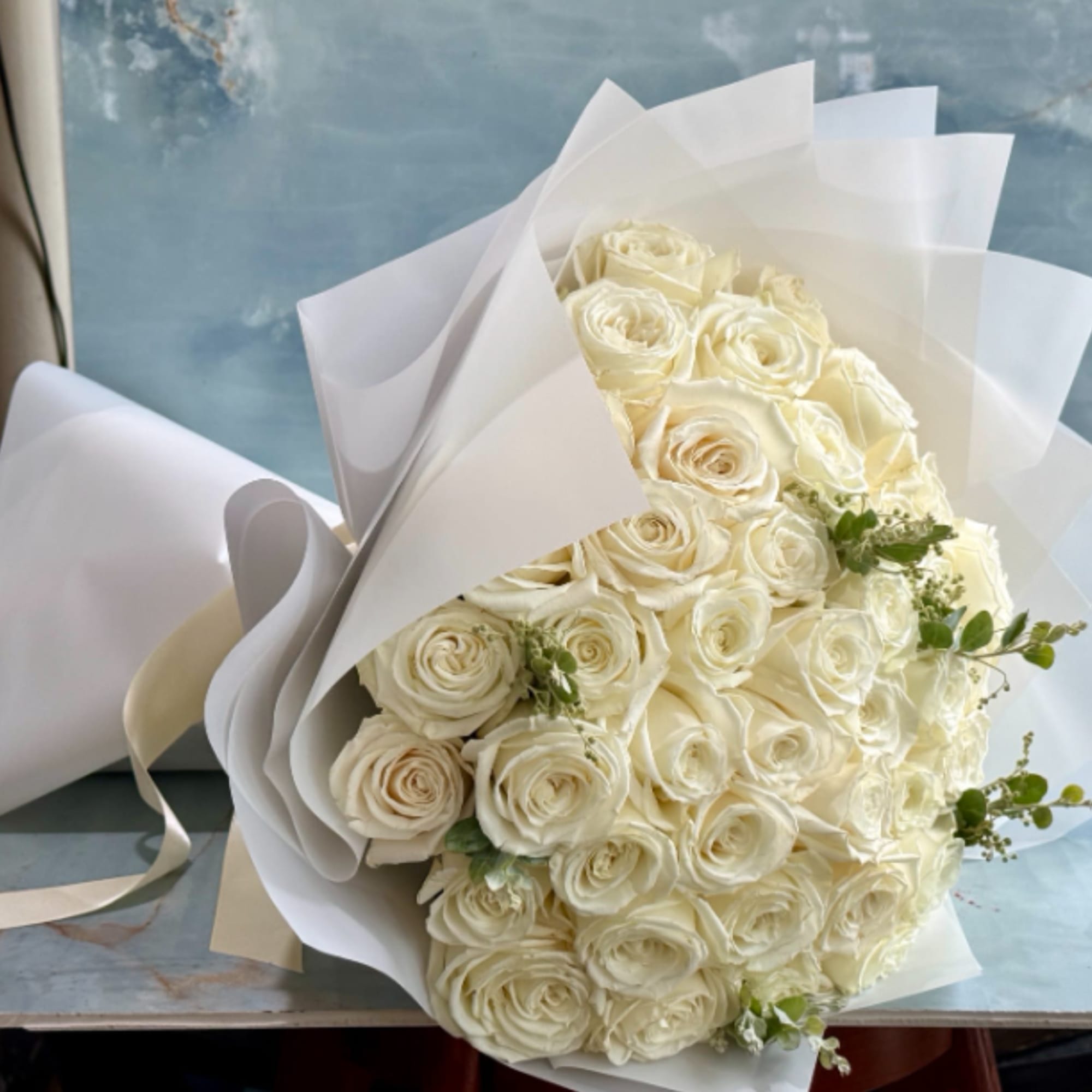 This bouquet has a timeless, luxurious feel. An elegant gathering of pristine