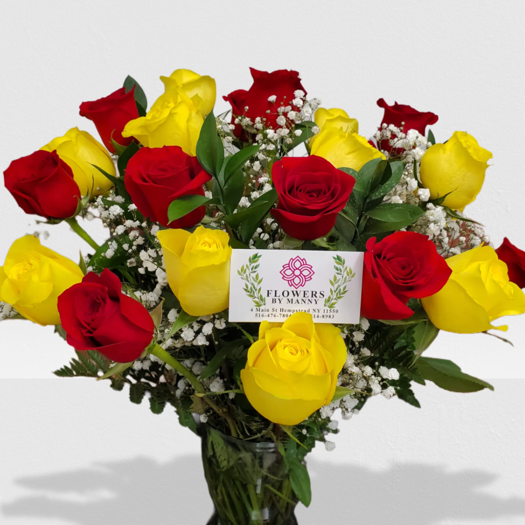 12 yellow roses and 12 red roses in vase with BB.