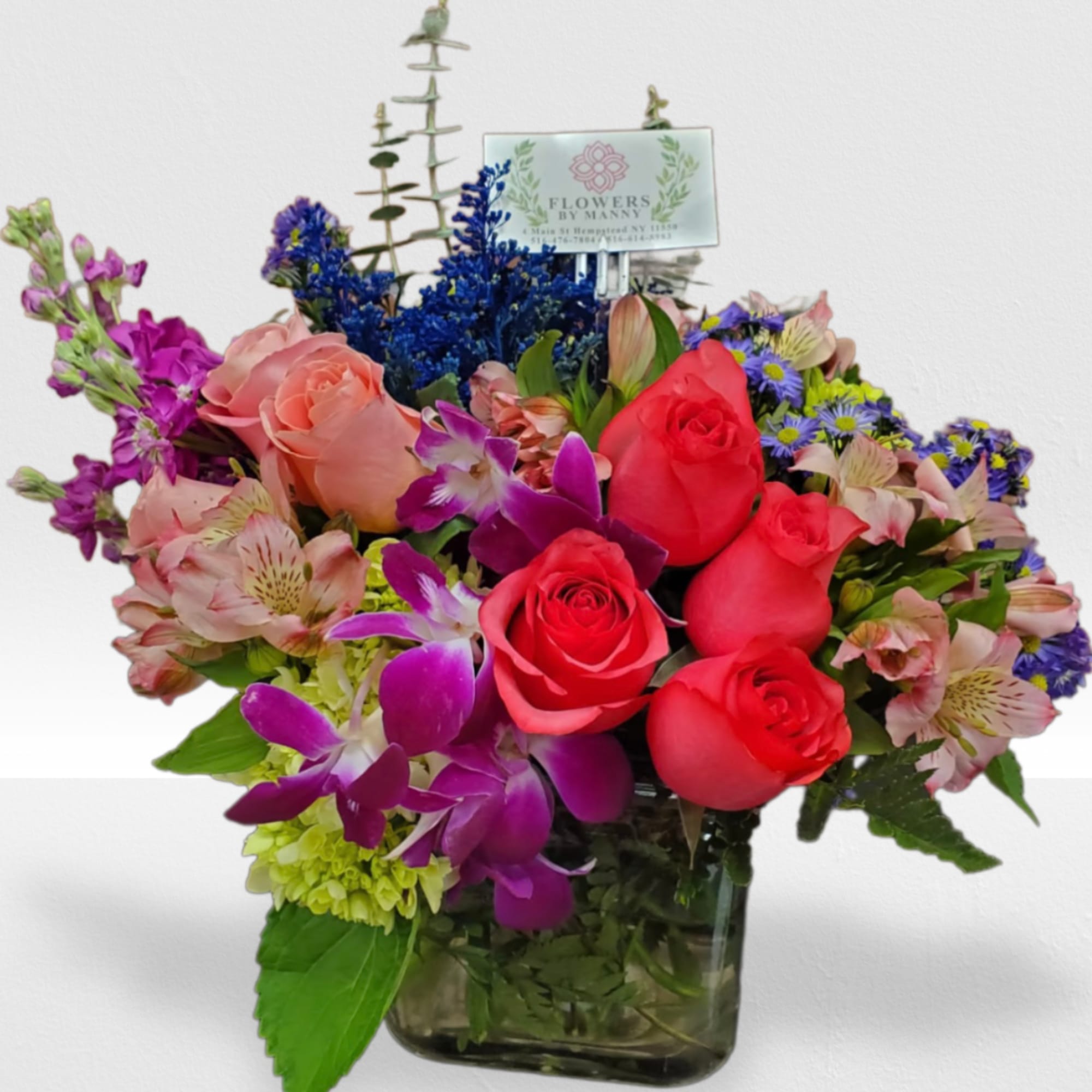 Mixed flowers for a garden looking arrangement.