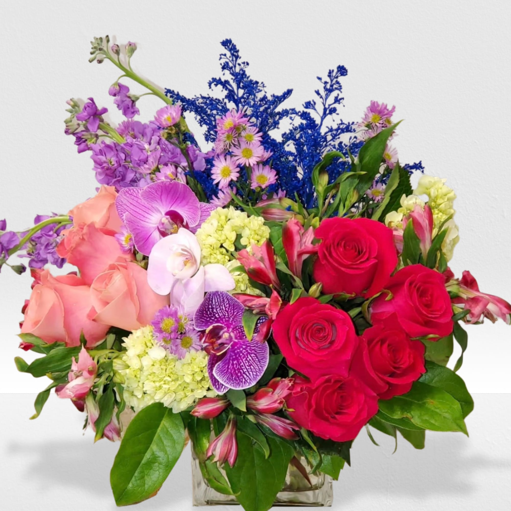 Mixed flowers for a garden looking arrangement.