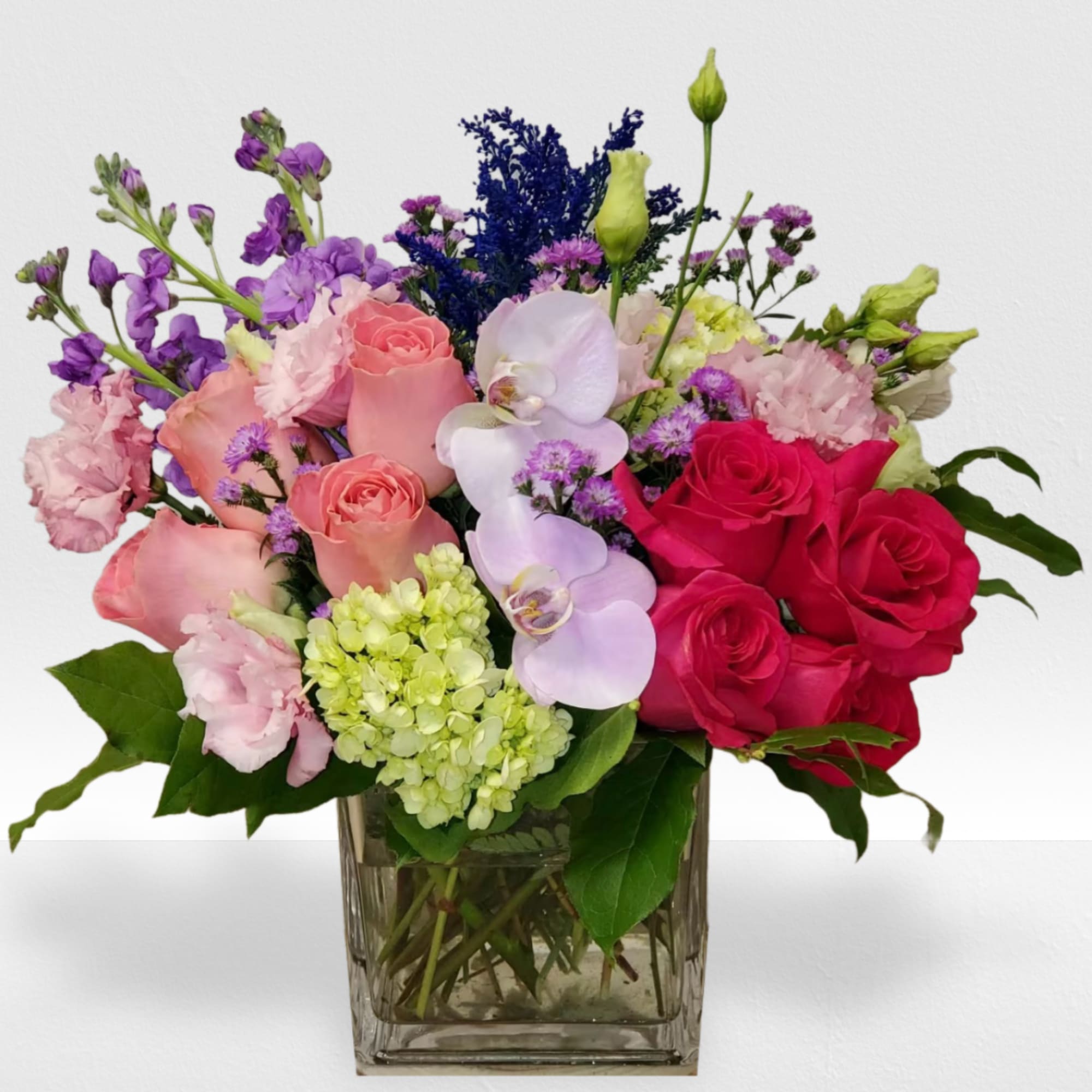 Mixed flowers for a garden looking arrangement.