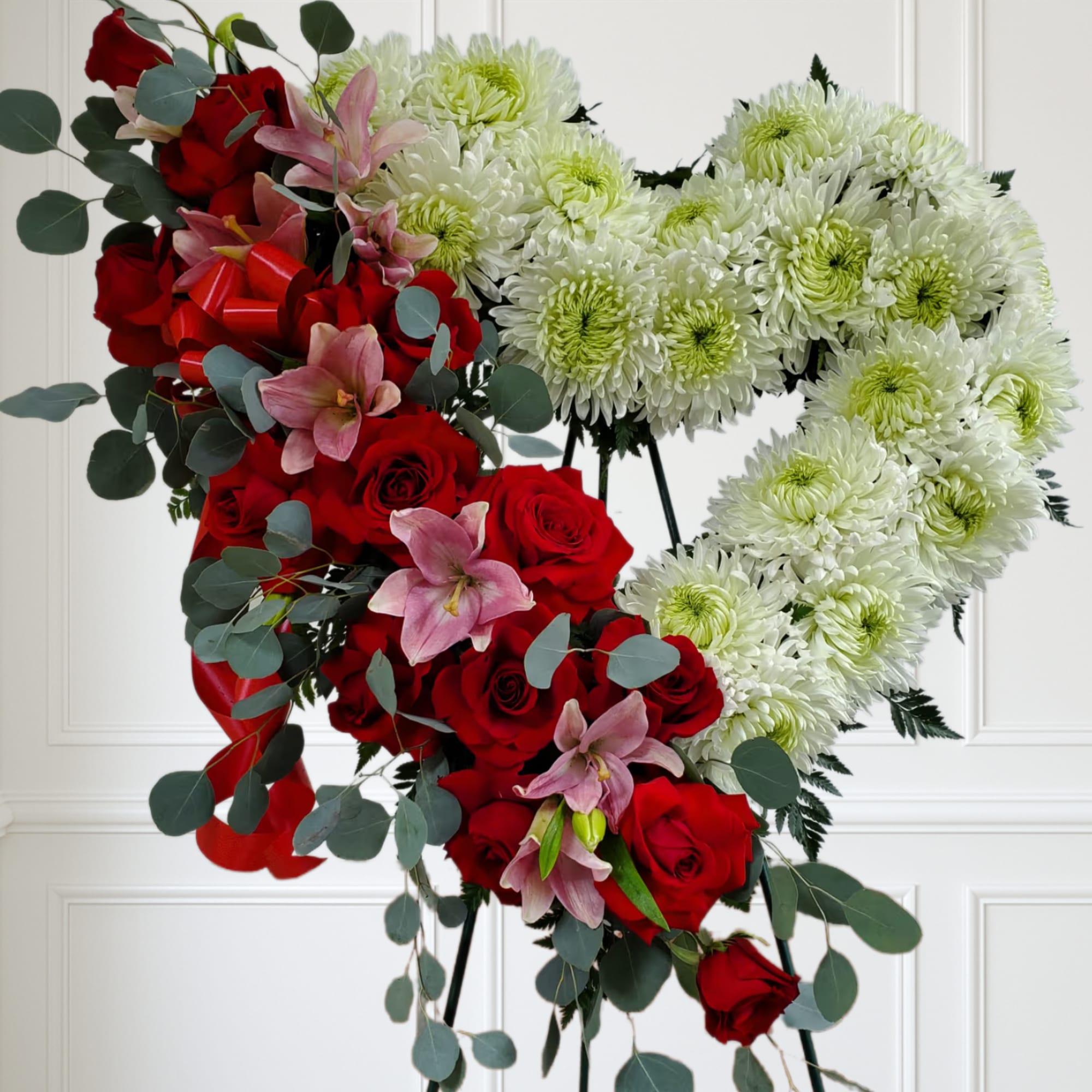 Open Heart with white flowers, red roses and lilys.